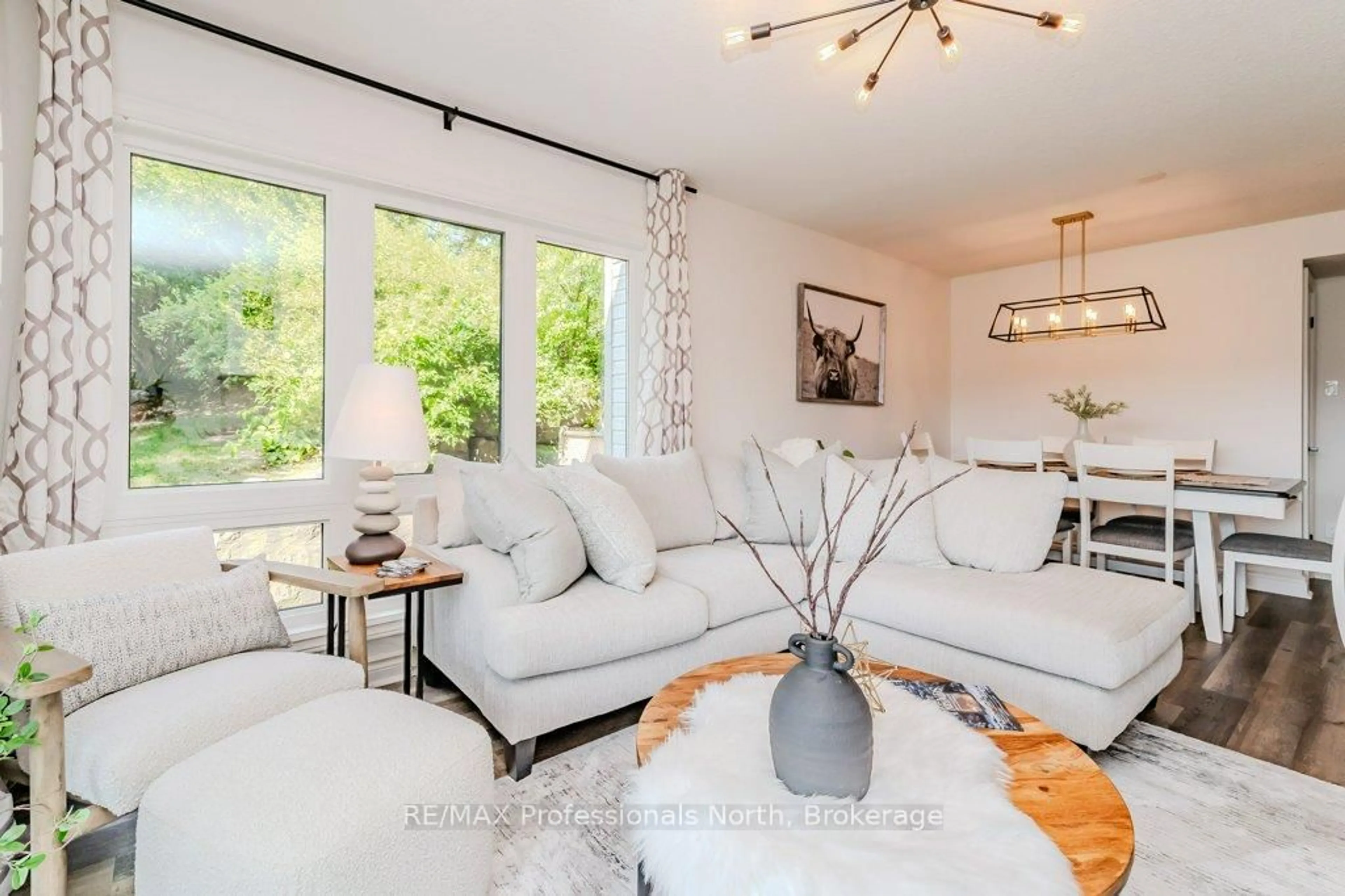 Living room with furniture, unknown for 1235 Deerhurst Dr #33-105, Huntsville Ontario P1H 2J4