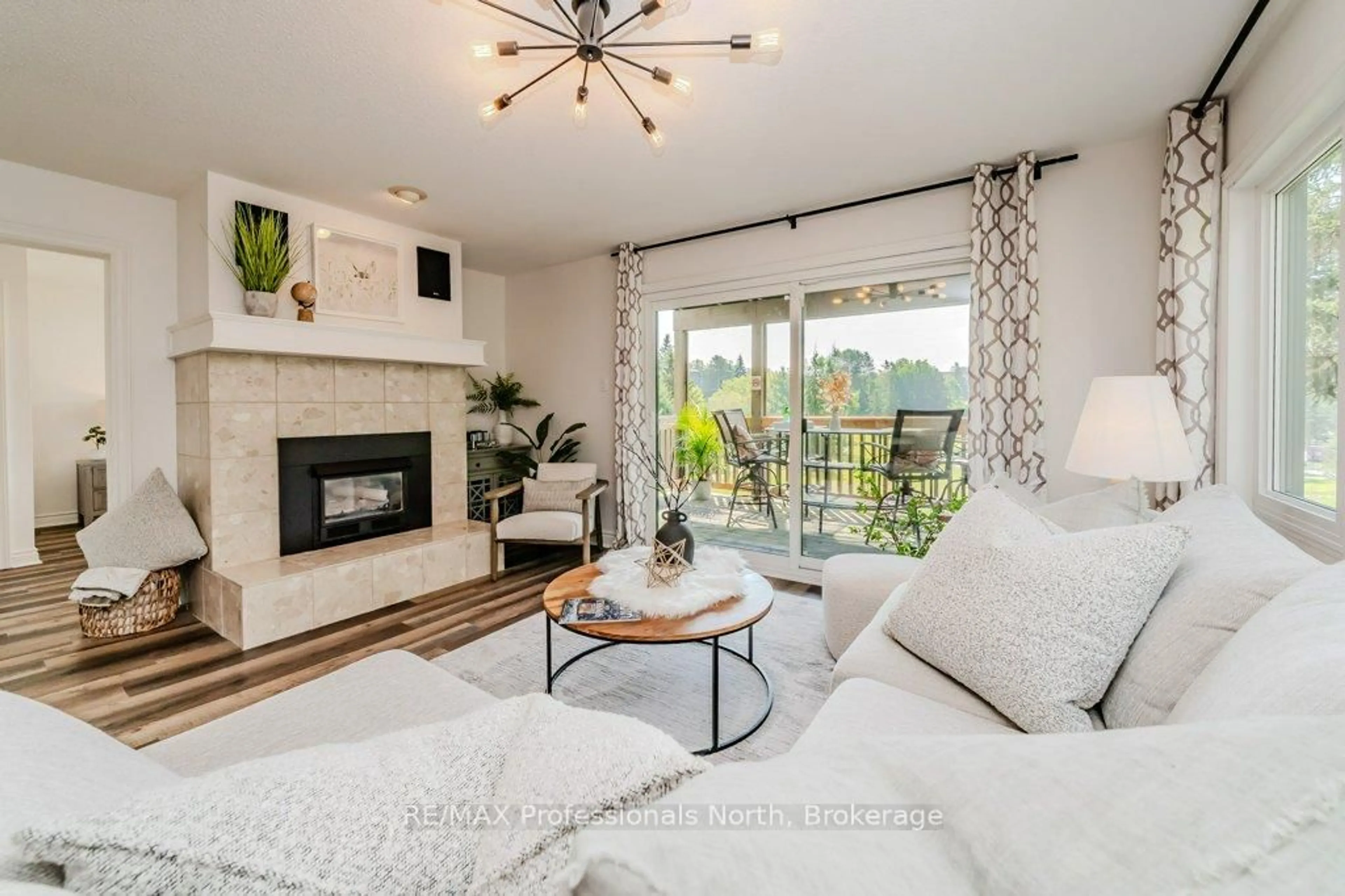 Living room with furniture, unknown for 1235 Deerhurst Dr #33-105, Huntsville Ontario P1H 2J4