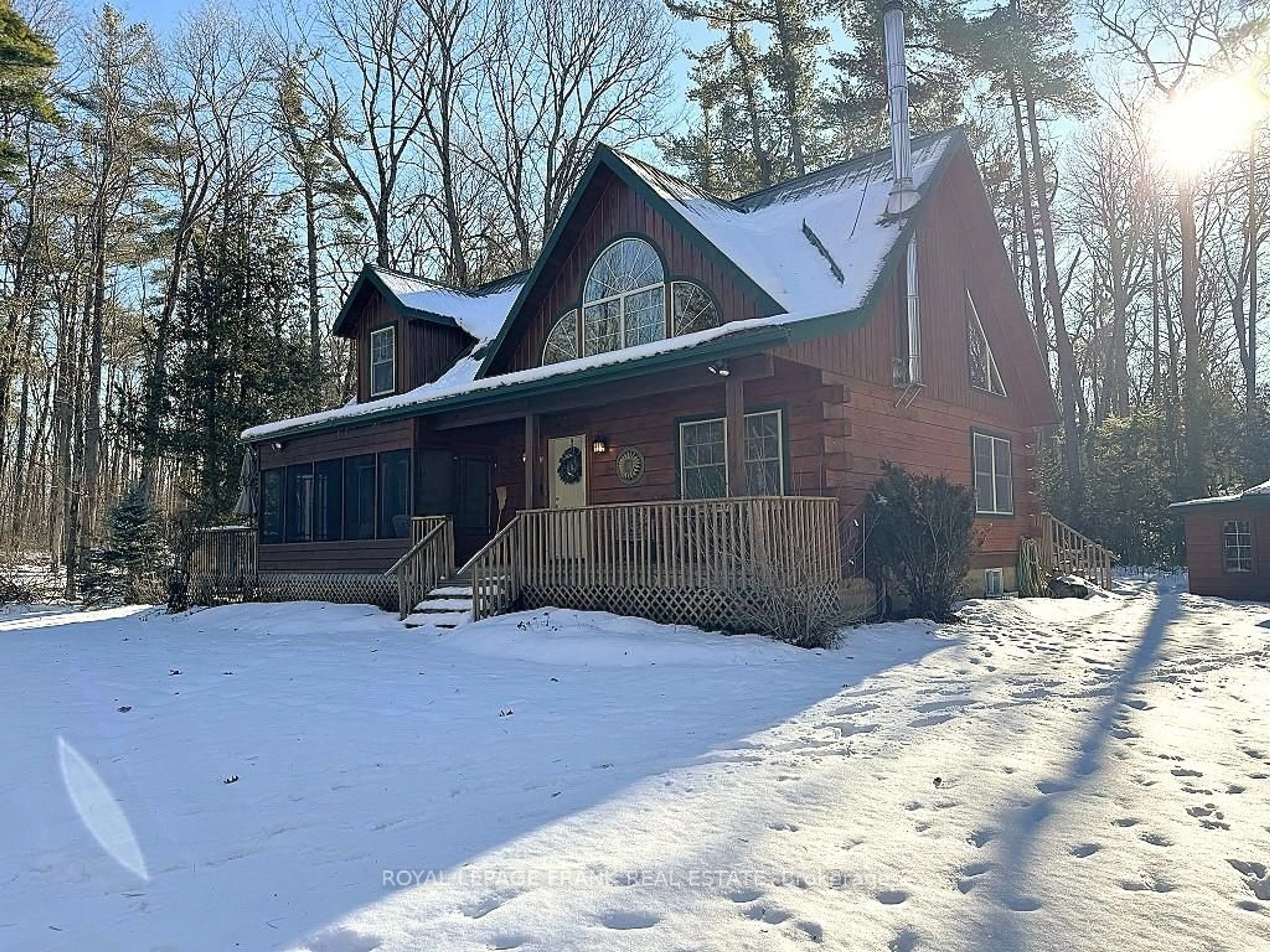 A pic from outside/outdoor area/front of a property/back of a property/a pic from drone, unknown for 120 Sugarbush Cres, Trent Lakes Ontario K0L 1J0