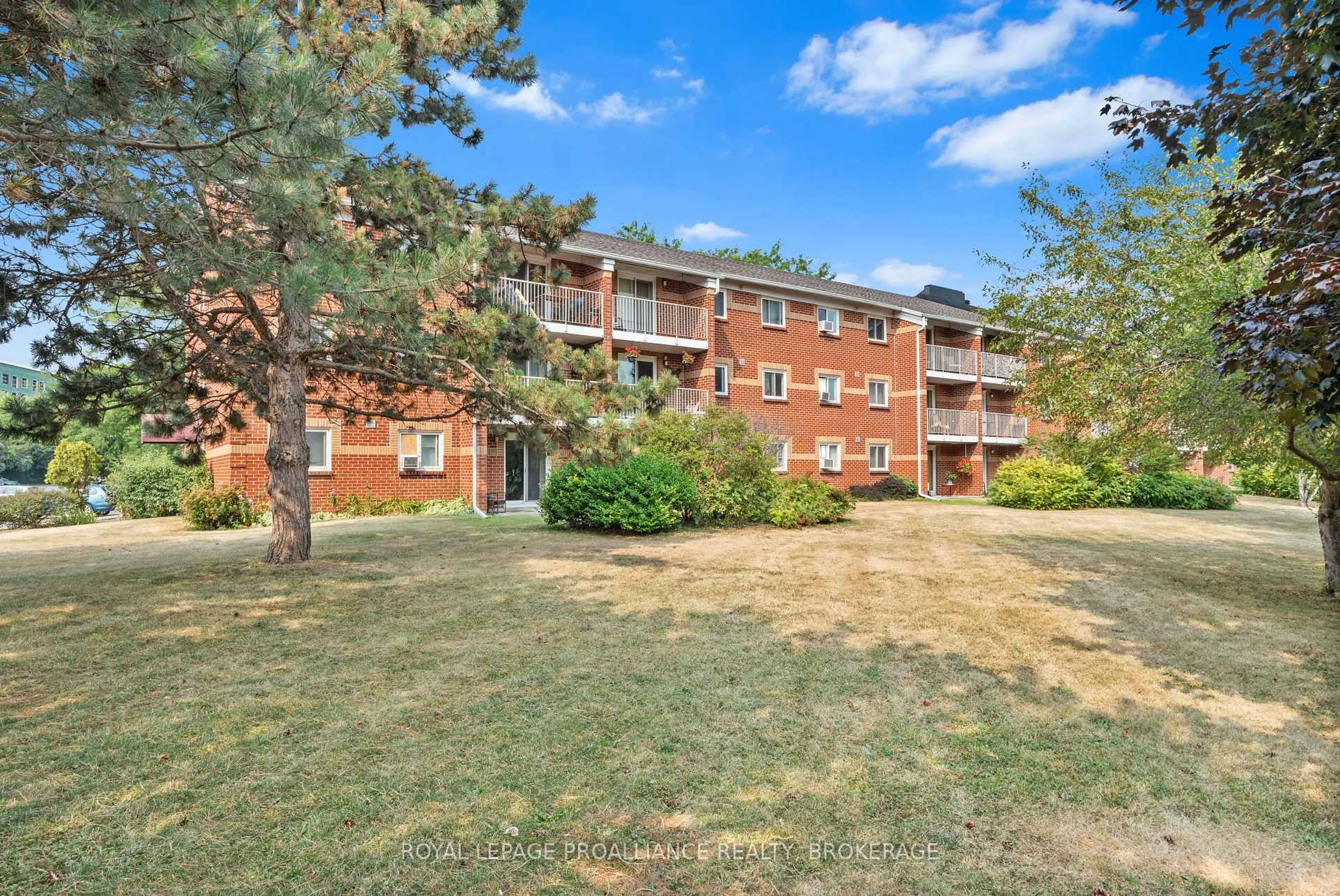 A pic from outside/outdoor area/front of a property/back of a property/a pic from drone, building for 573 Armstrong Rd #302, Kingston Ontario K7M 8J8