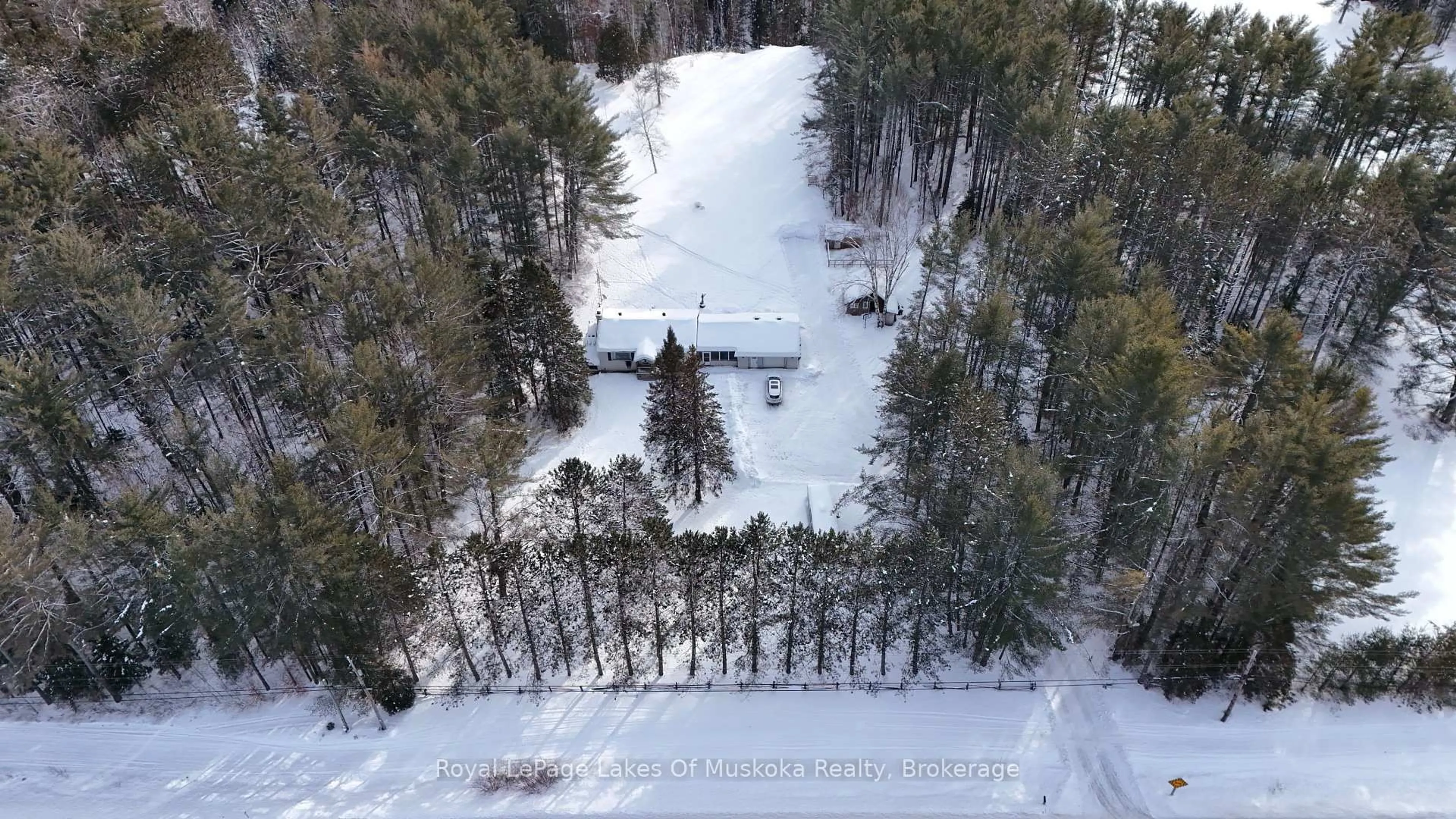 A pic from outside/outdoor area/front of a property/back of a property/a pic from drone, forest/trees view for 2892 60 Highway, Lake of Bays Ontario P0A 1H0