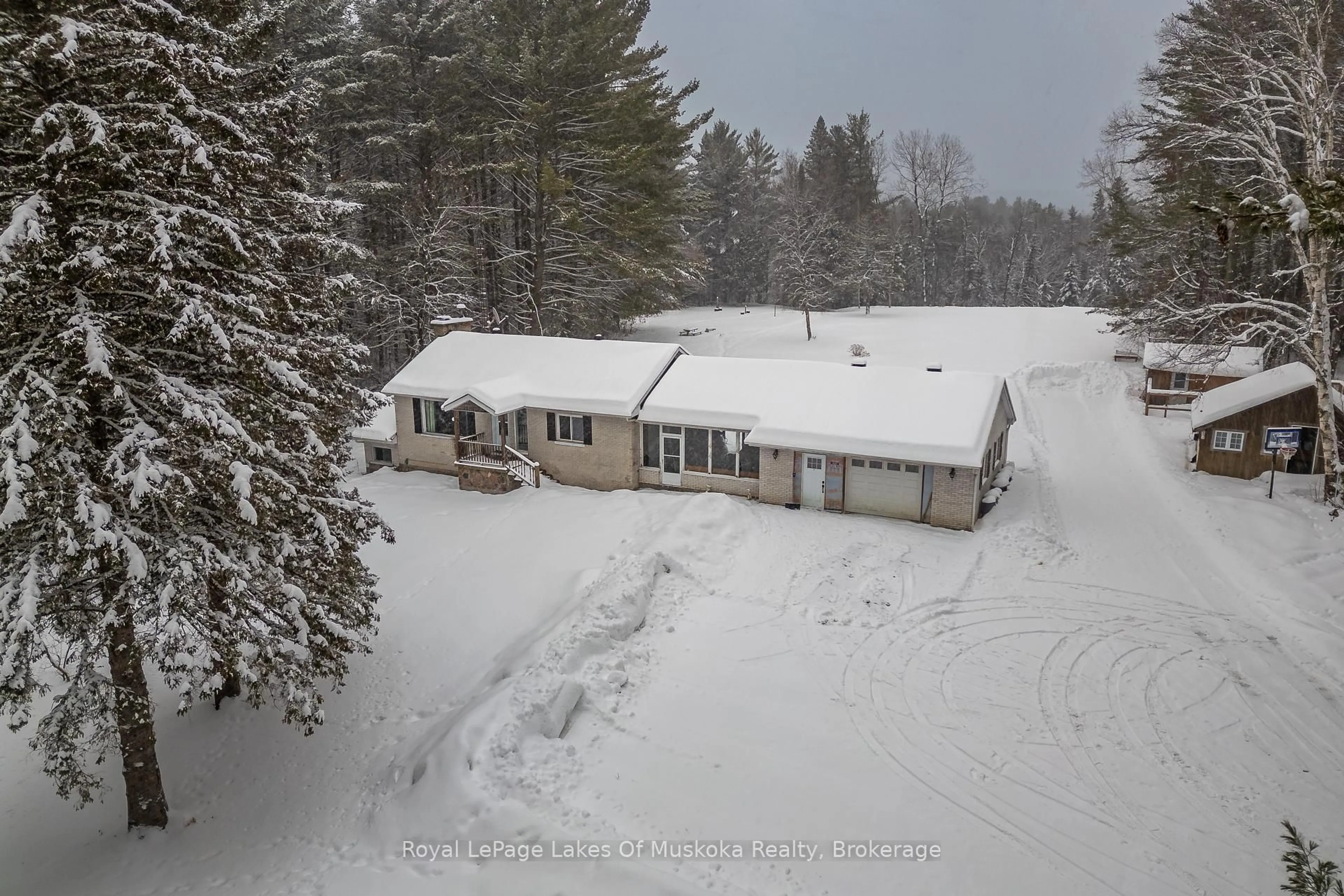 A pic from outside/outdoor area/front of a property/back of a property/a pic from drone, unknown for 2892 60 Highway, Lake of Bays Ontario P0A 1H0