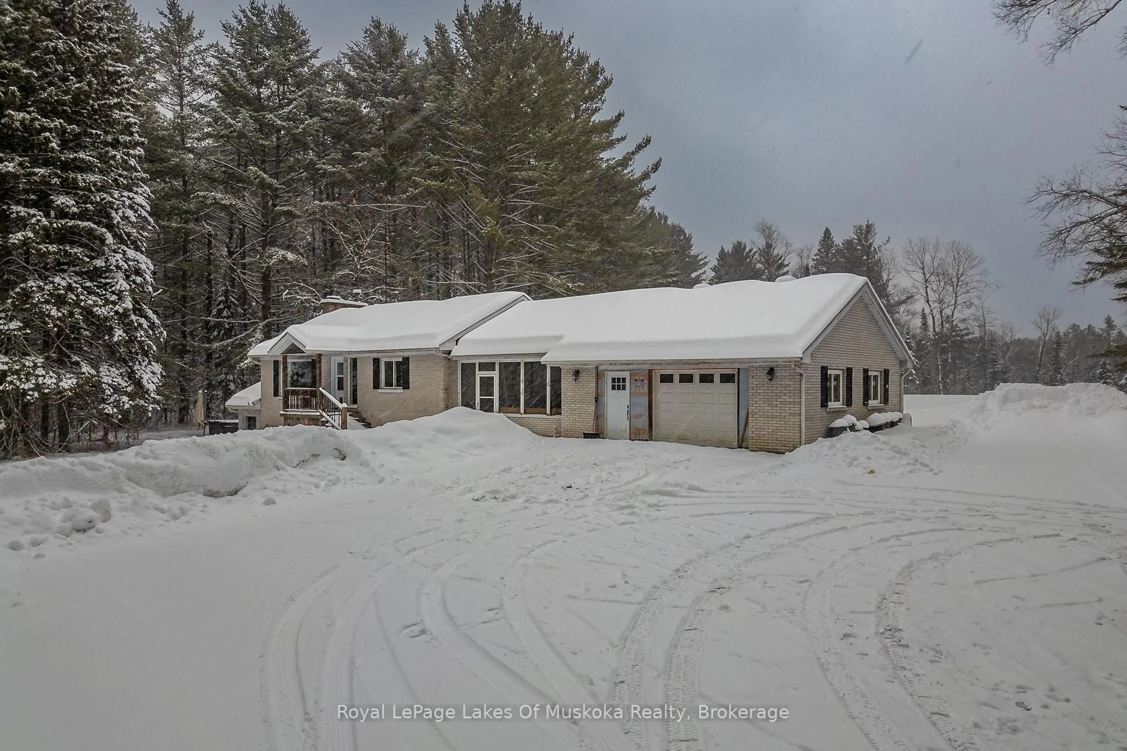 A pic from outside/outdoor area/front of a property/back of a property/a pic from drone, street for 2892 60 Highway, Lake of Bays Ontario P0A 1H0