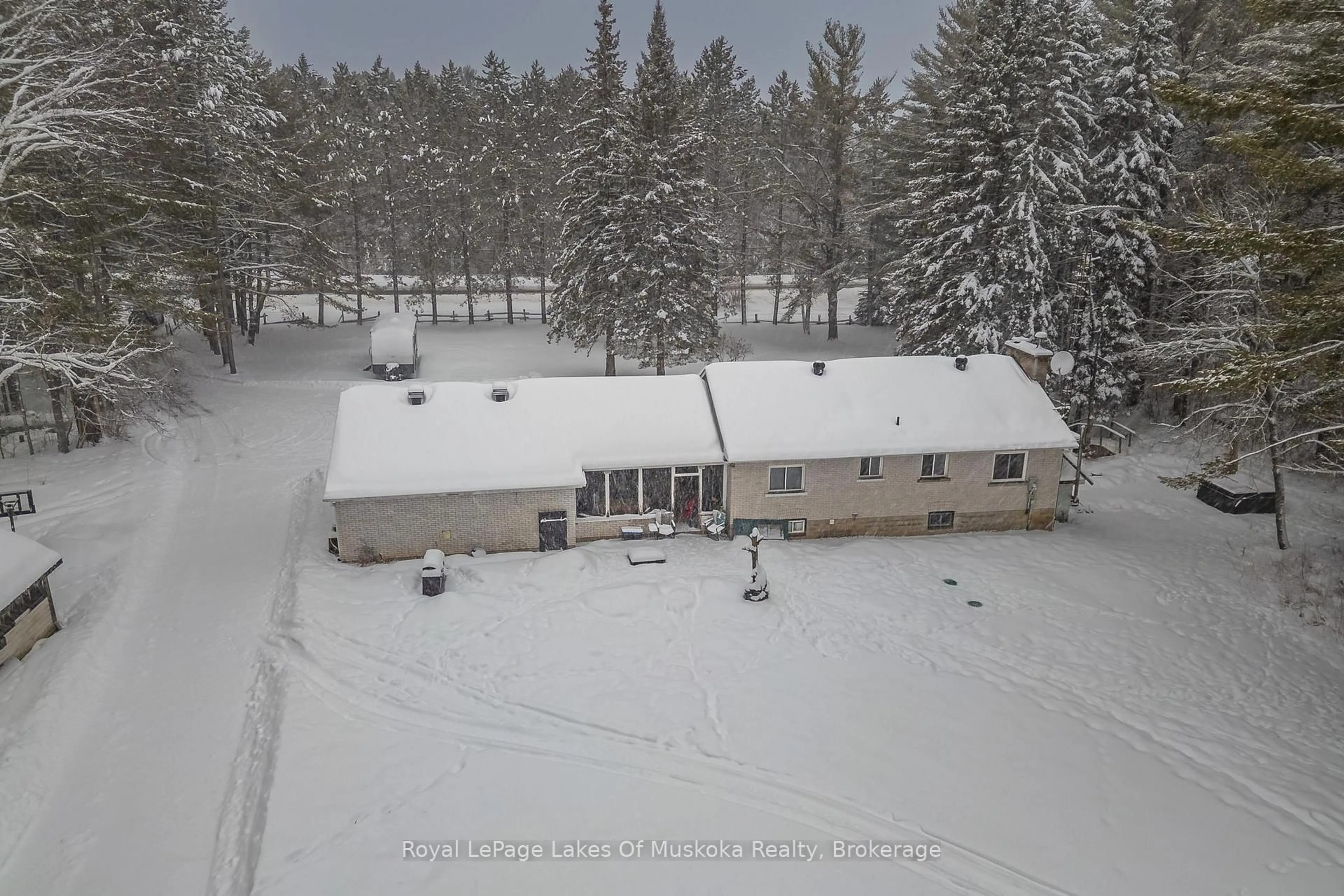 A pic from outside/outdoor area/front of a property/back of a property/a pic from drone, unknown for 2892 60 Highway, Lake of Bays Ontario P0A 1H0