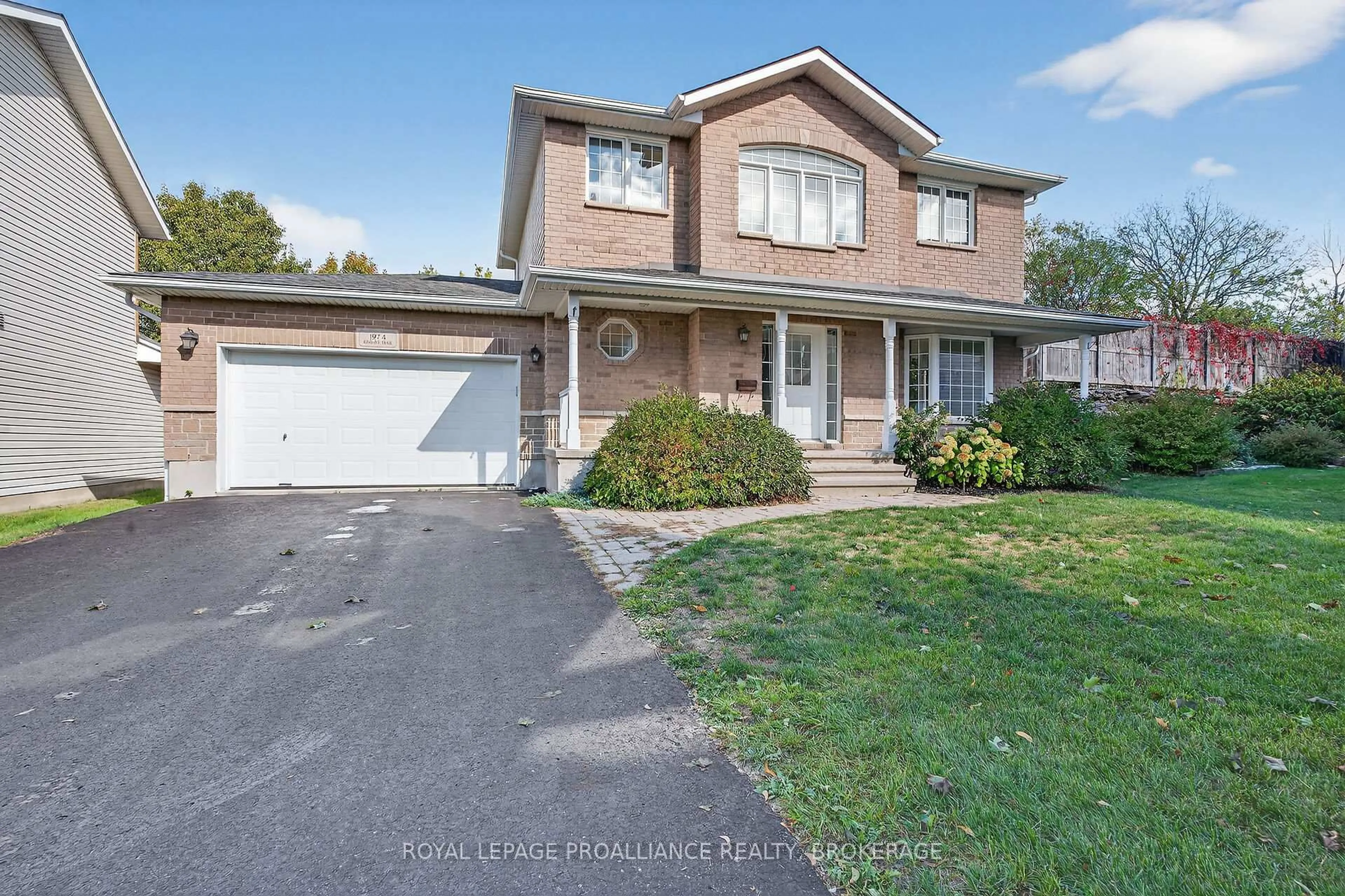 A pic from outside/outdoor area/front of a property/back of a property/a pic from drone, street for 1974 Geology Tr, Kingston Ontario K7M 9H5