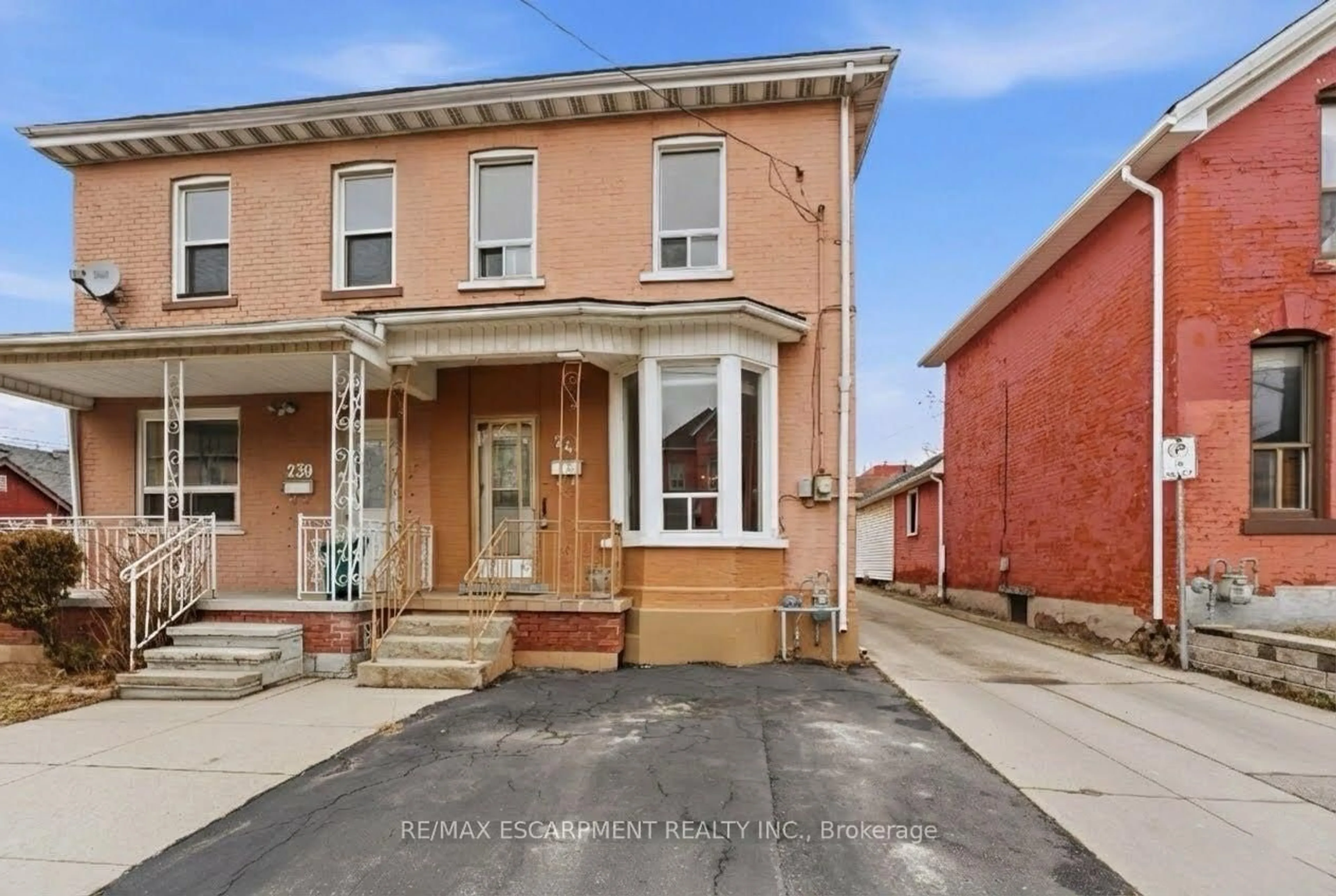 Home with brick exterior material, street for 241 Robert St, Hamilton Ontario L8L 2R2