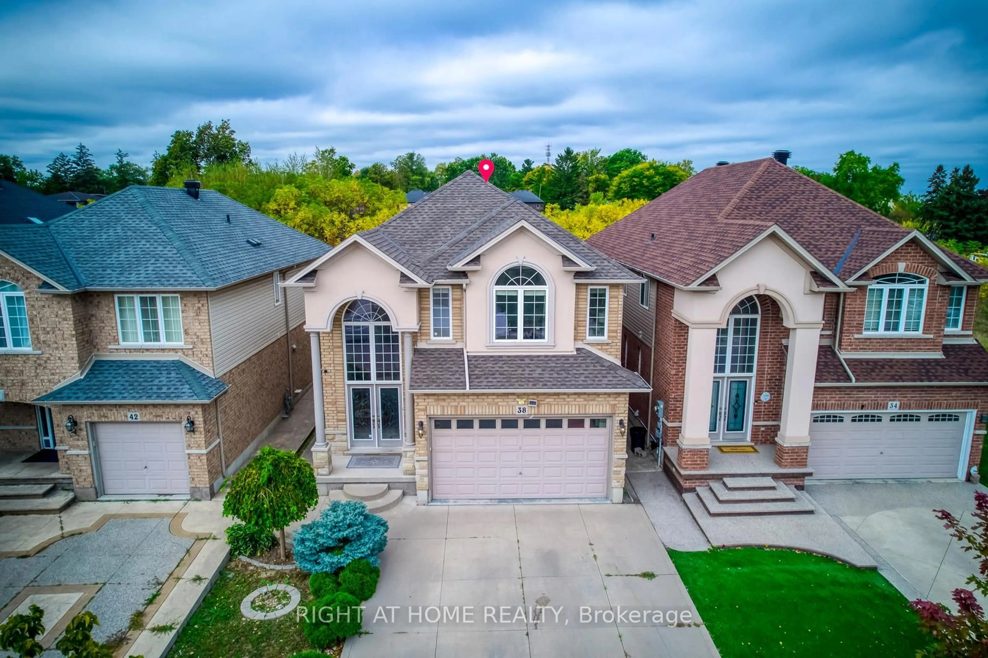 A pic from outside/outdoor area/front of a property/back of a property/a pic from drone, street for 38 Assisi St, Hamilton Ontario L8W 0A5