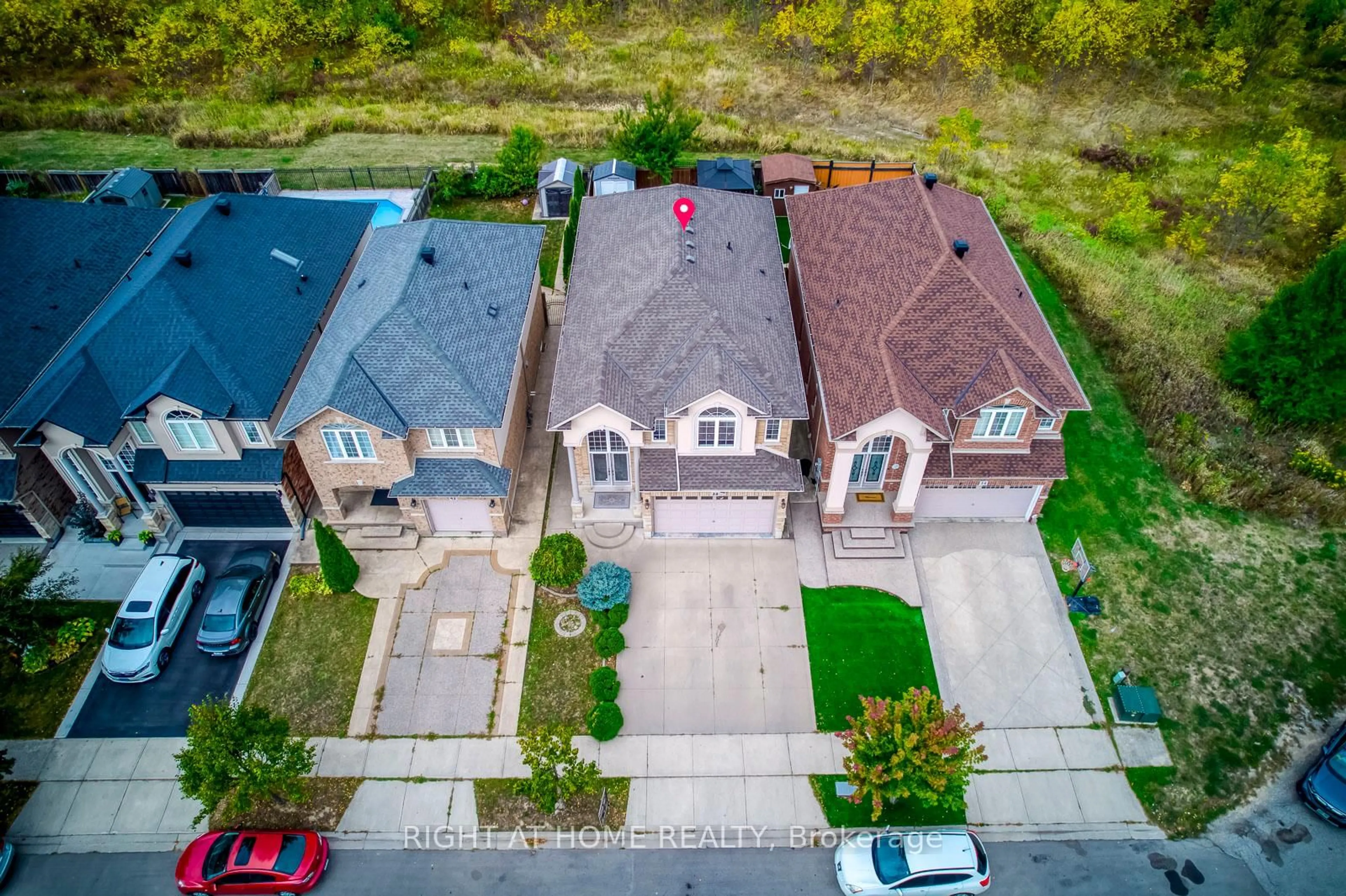 A pic from outside/outdoor area/front of a property/back of a property/a pic from drone, street for 38 Assisi St, Hamilton Ontario L8W 0A5