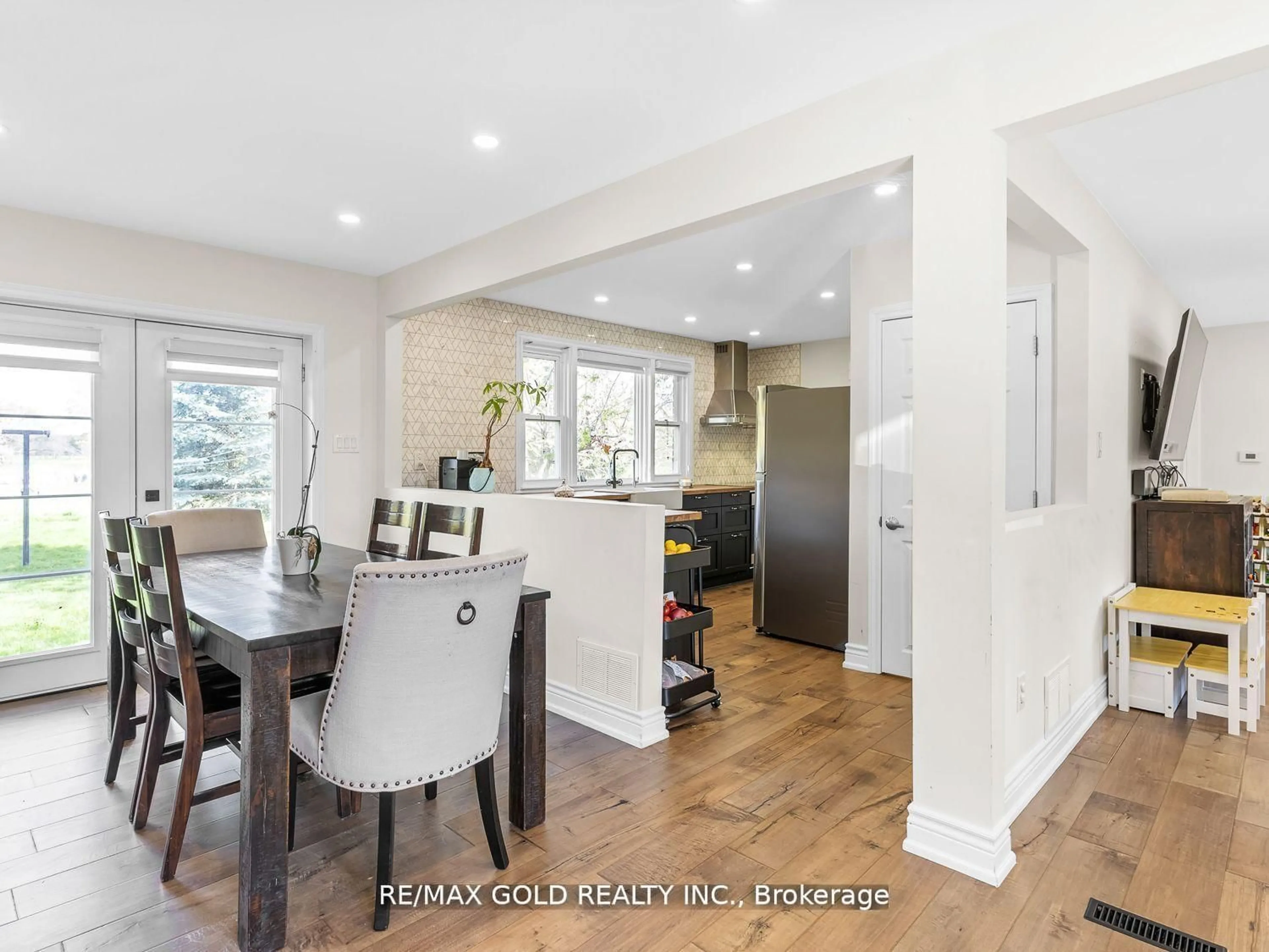 Open concept kitchen, wood/laminate floor for 8017 Highway 7, Guelph/Eramosa Ontario N1H 6H8