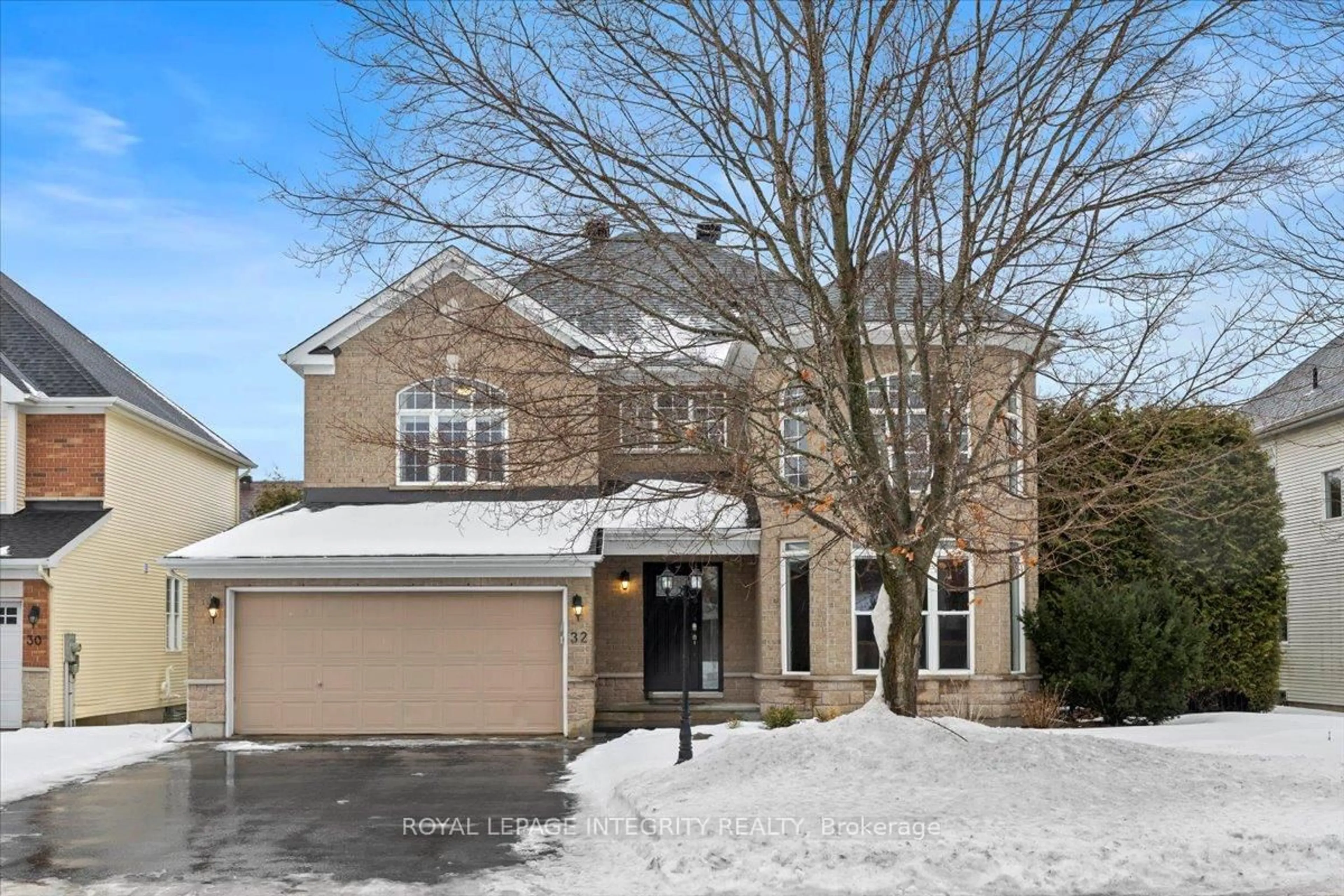 Home with brick exterior material, street for 32 Eliza Cres, Stittsville Ontario K2S 2A3