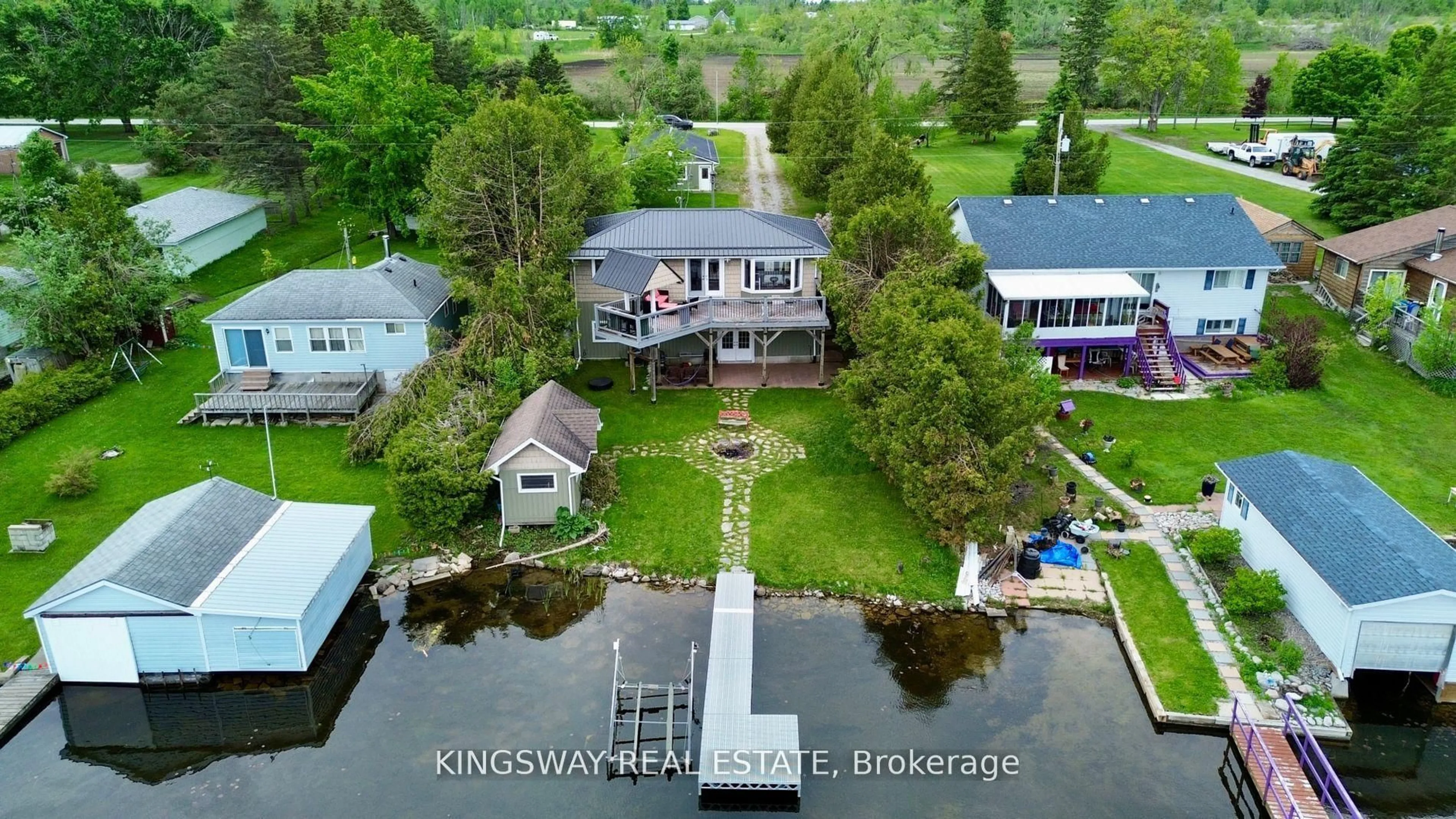 A pic from outside/outdoor area/front of a property/back of a property/a pic from drone, water/lake/river/ocean view for 18 Mitchellview Rd, Kawartha Lakes Ontario K0M 2B0