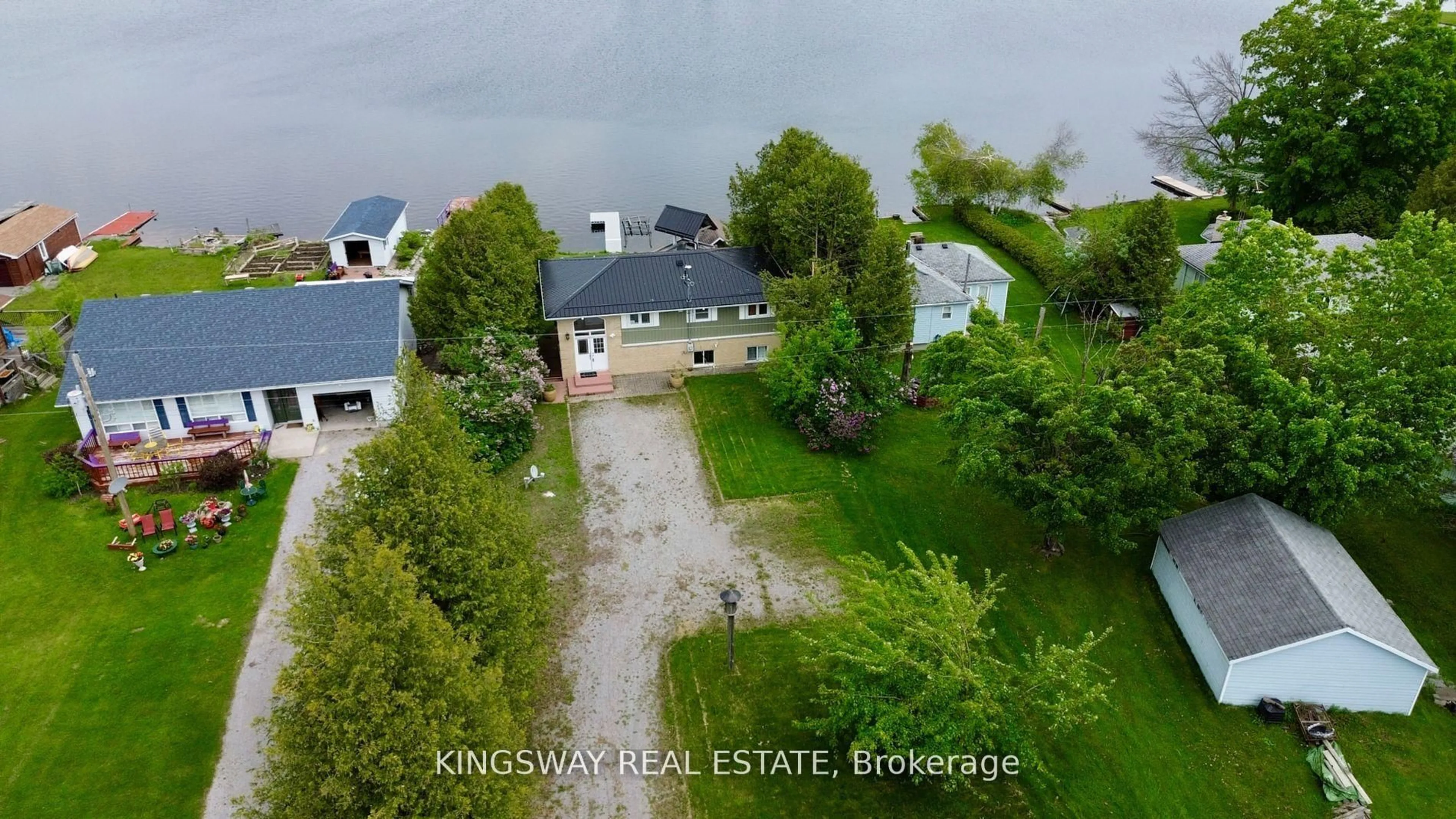 A pic from outside/outdoor area/front of a property/back of a property/a pic from drone, water/lake/river/ocean view for 18 Mitchellview Rd, Kawartha Lakes Ontario K0M 2B0