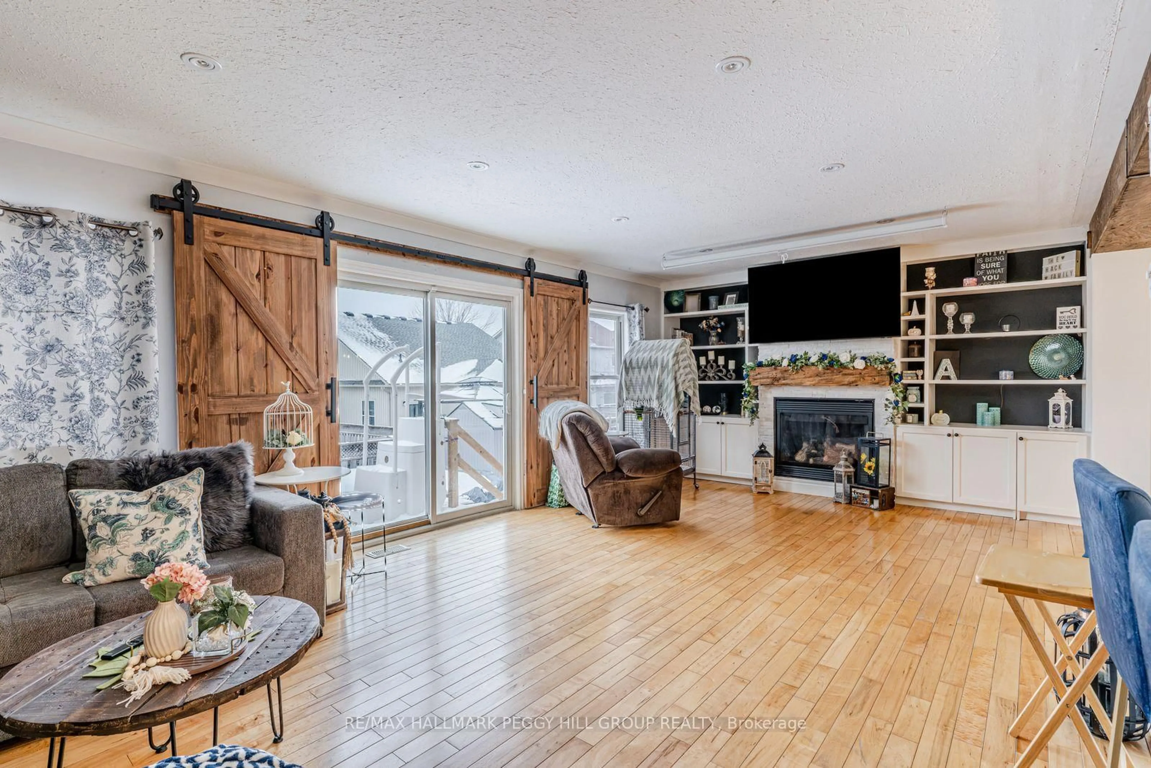 Living room with furniture, wood/laminate floor for 469 Fiddle Park Lane, Shelburne Ontario L9V 3C9