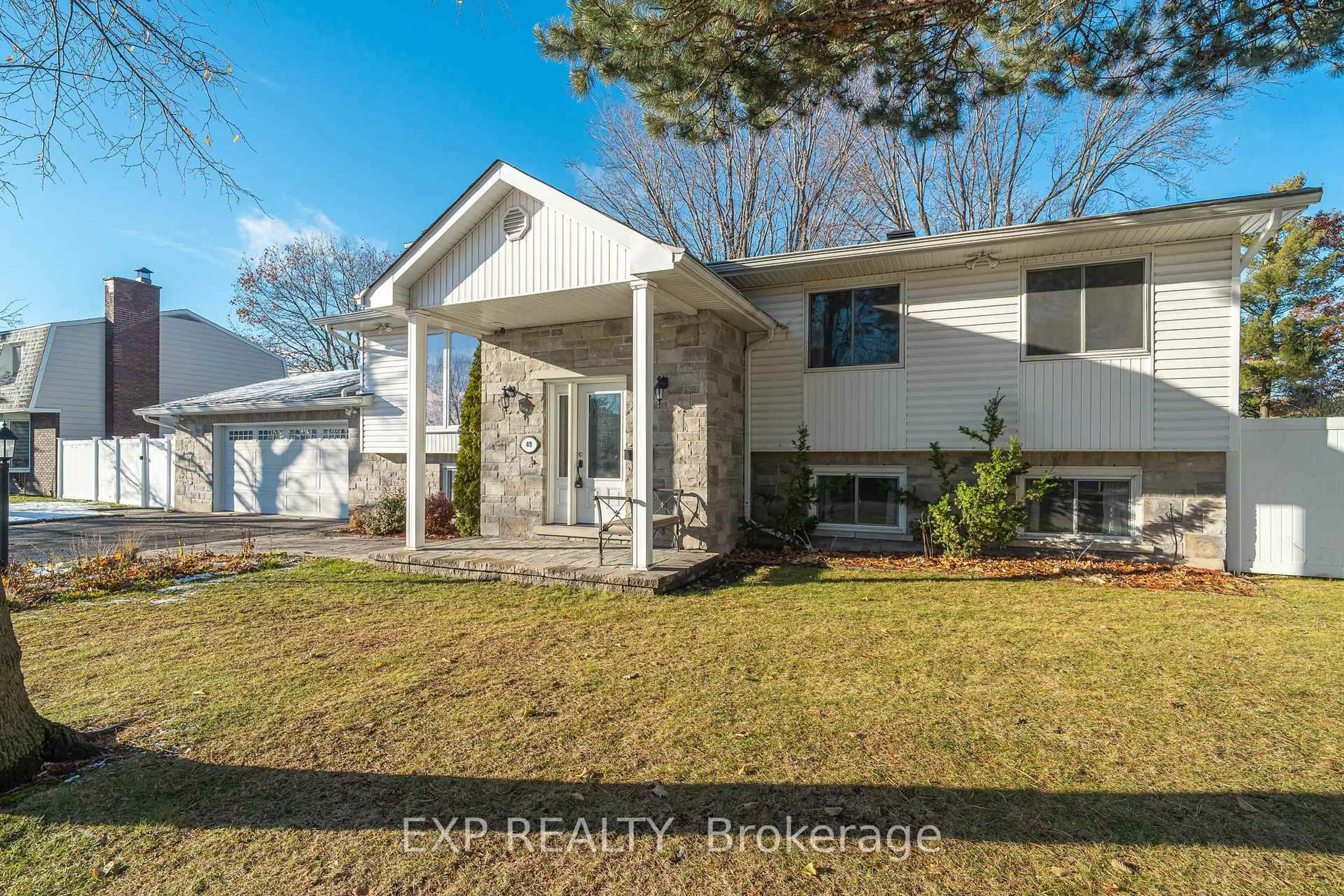 Home with vinyl exterior material, street for 49 Larkin Dr, Ottawa Ontario K2J 1B1