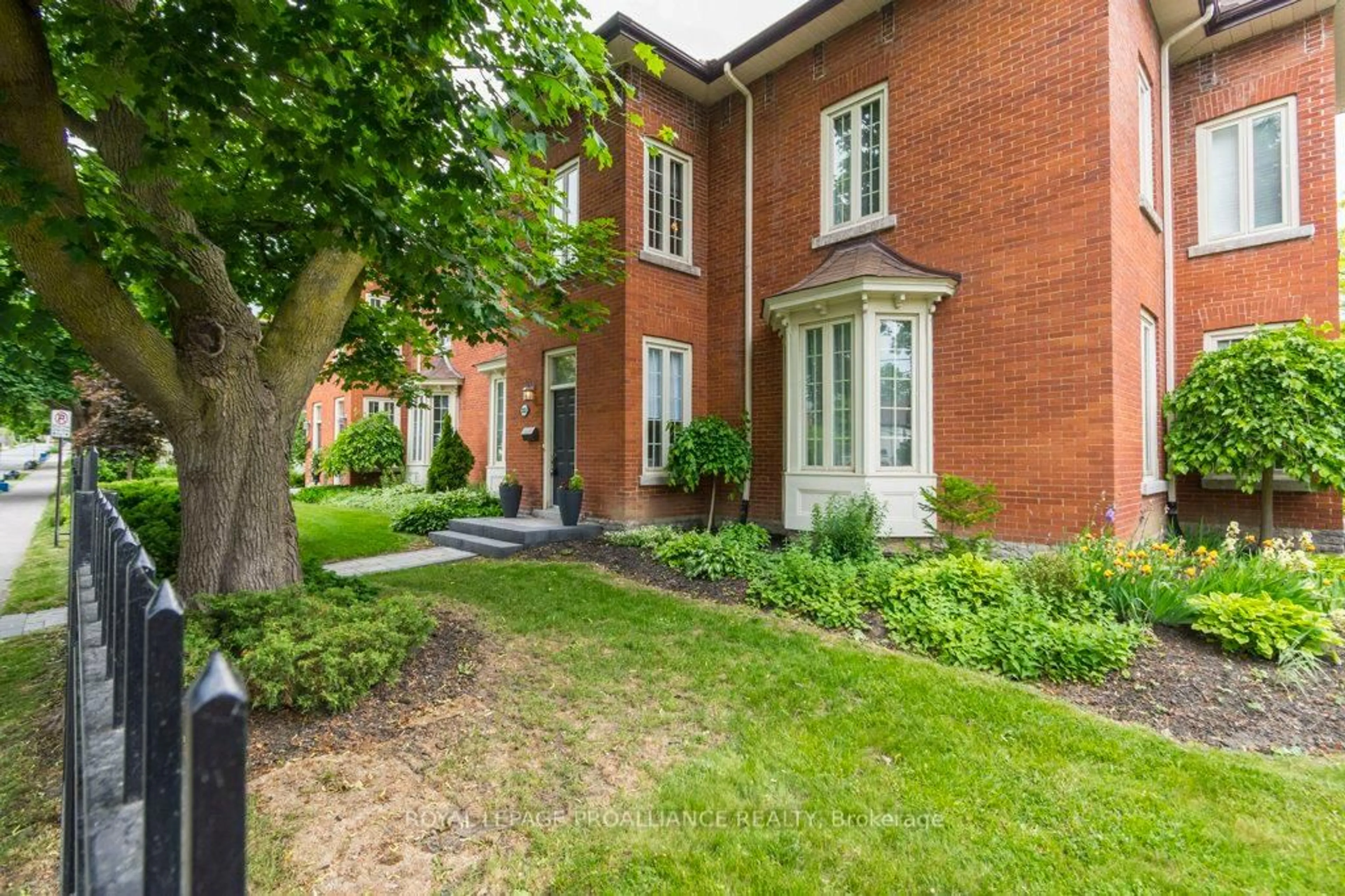 Home with brick exterior material, street for 233 John St #5, Belleville Ontario K8N 3G2