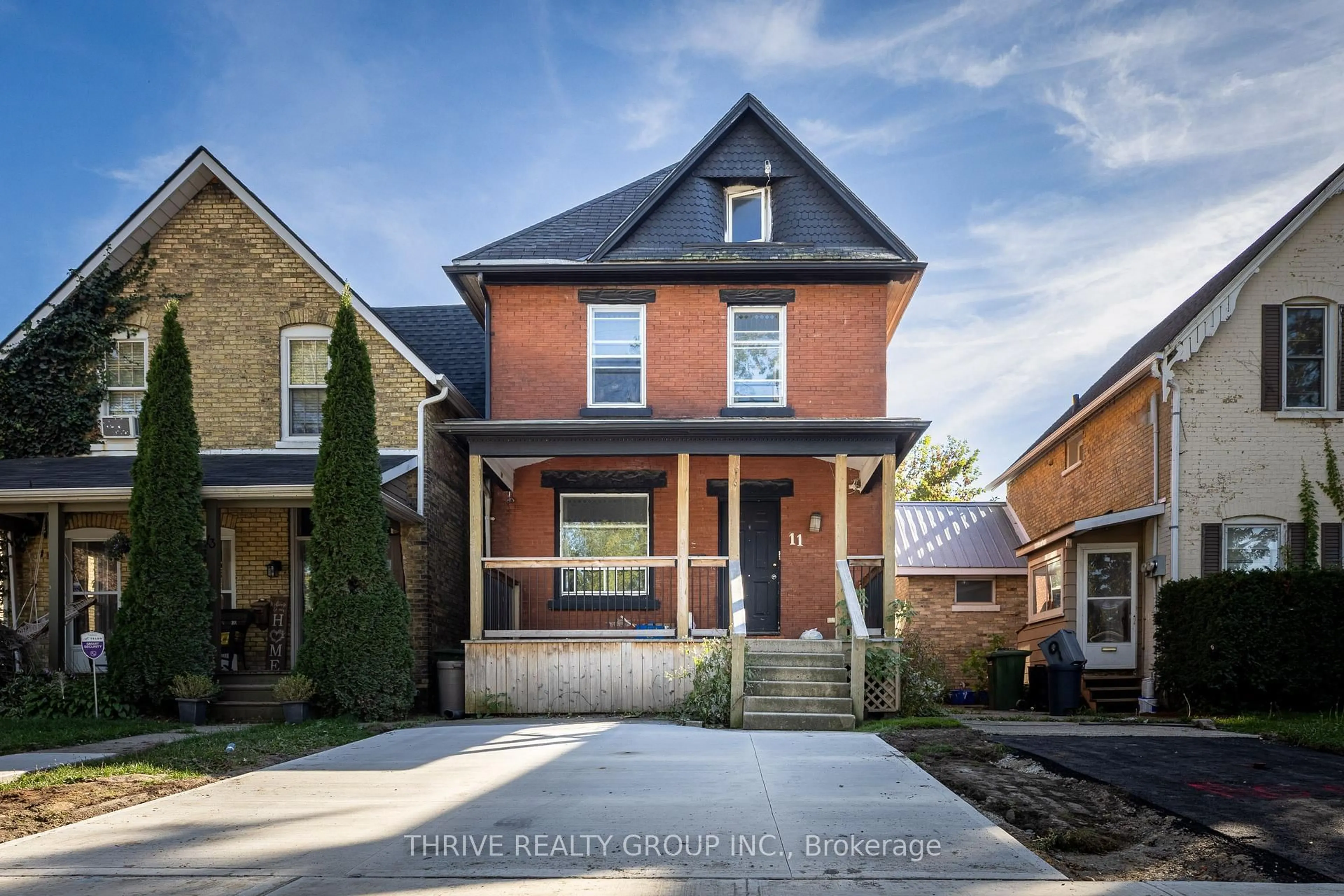 Home with brick exterior material, street for 11 Forest Ave, St. Thomas Ontario N5R 2J1