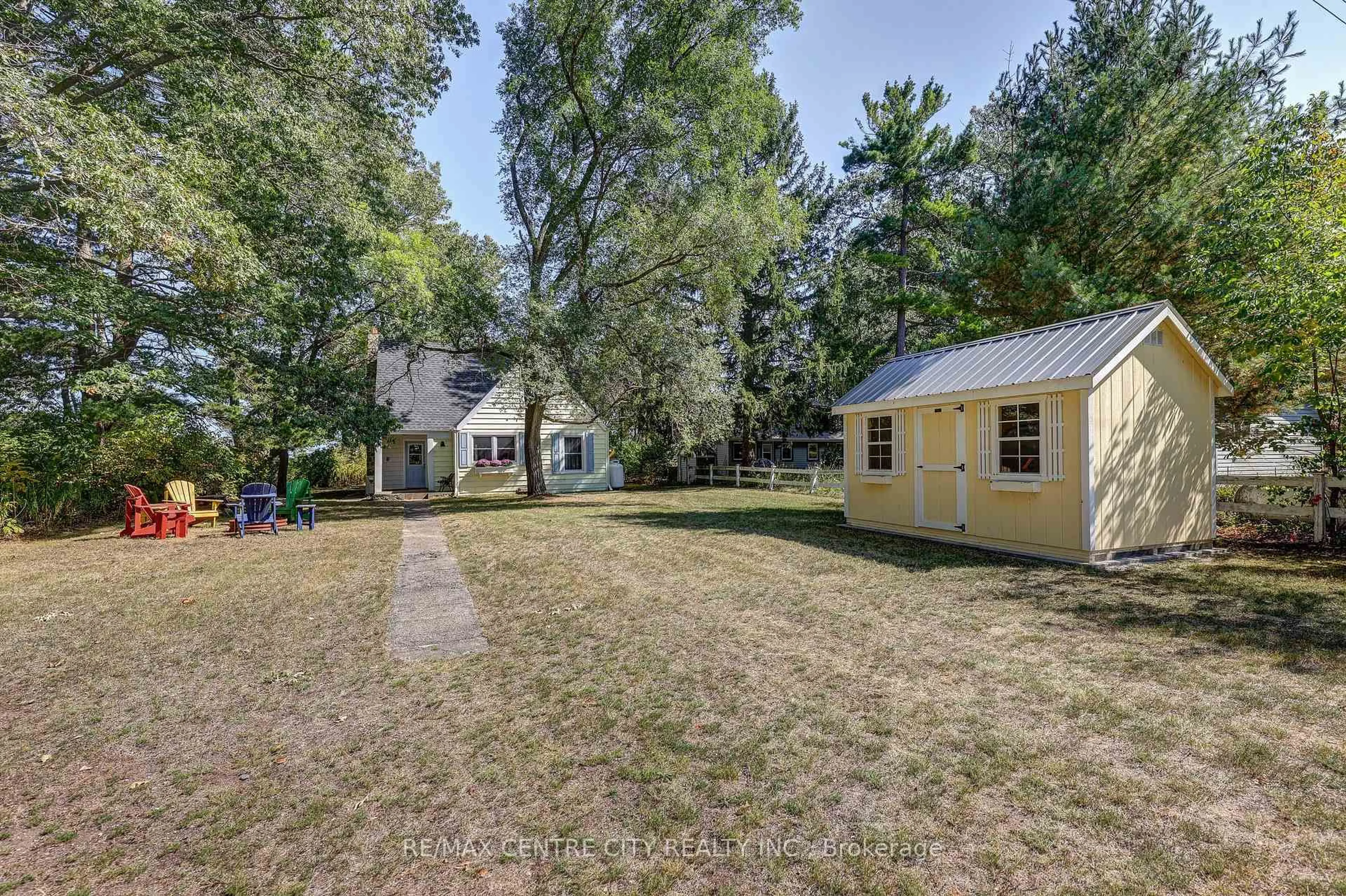 A pic from outside/outdoor area/front of a property/back of a property/a pic from drone, street for 17374 Lakeshore Rd, Chatham-Kent Ontario N0P 1X0