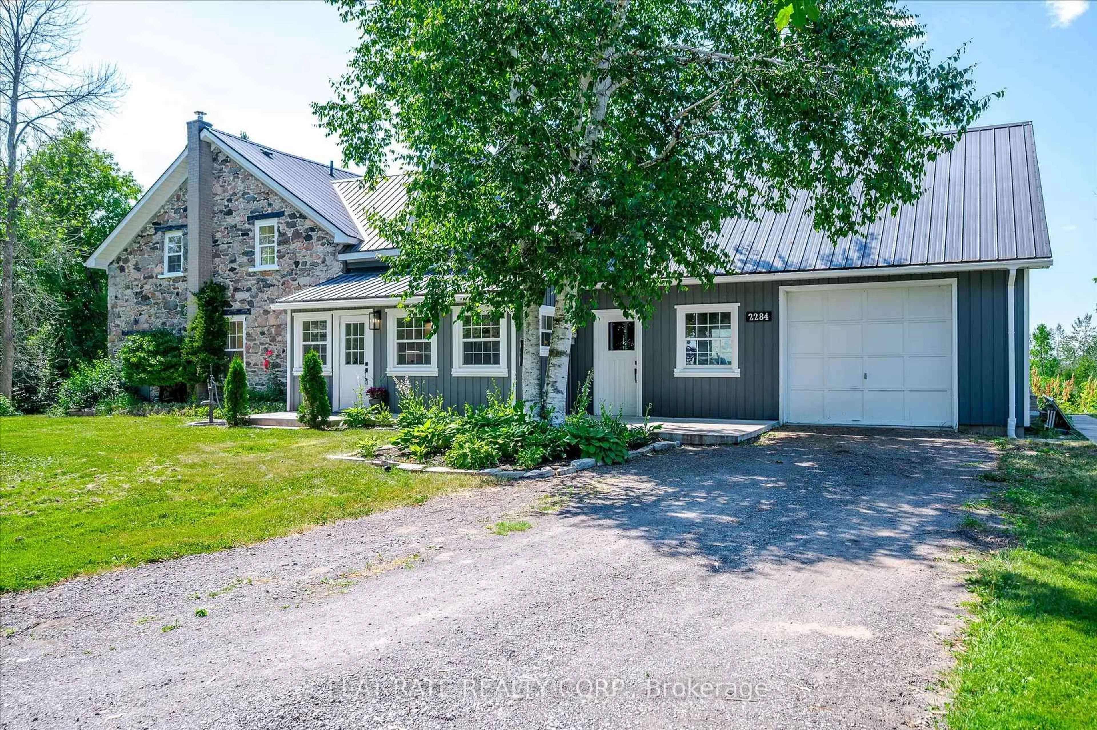 A pic from outside/outdoor area/front of a property/back of a property/a pic from drone, street for 2284 LANCASTER Rd, Otonabee-South Monaghan Ontario K9J 6X7