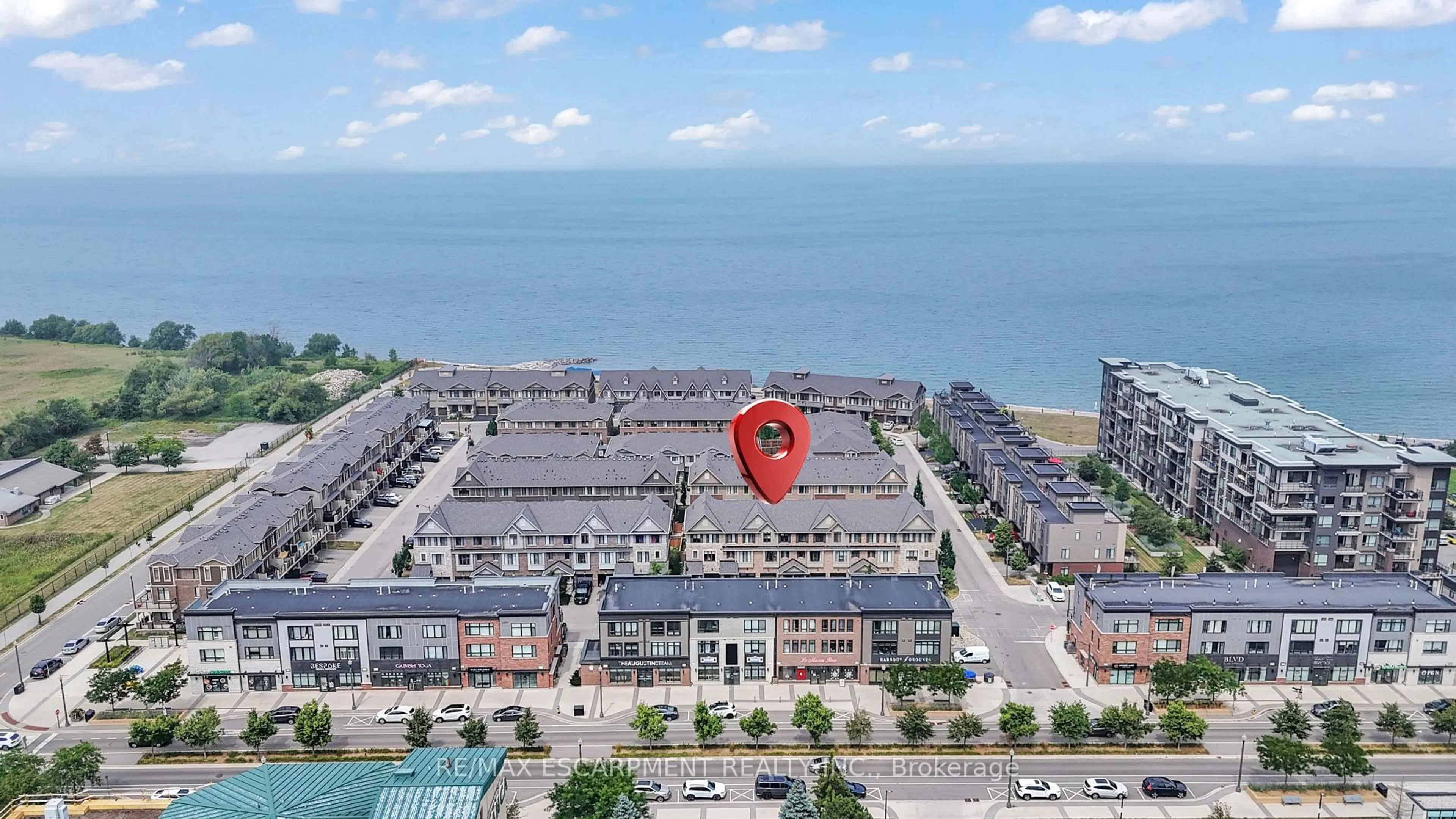 A pic from outside/outdoor area/front of a property/back of a property/a pic from drone, water/lake/river/ocean view for 68 Esplanade Lane, Grimsby Ontario L3M 0H2