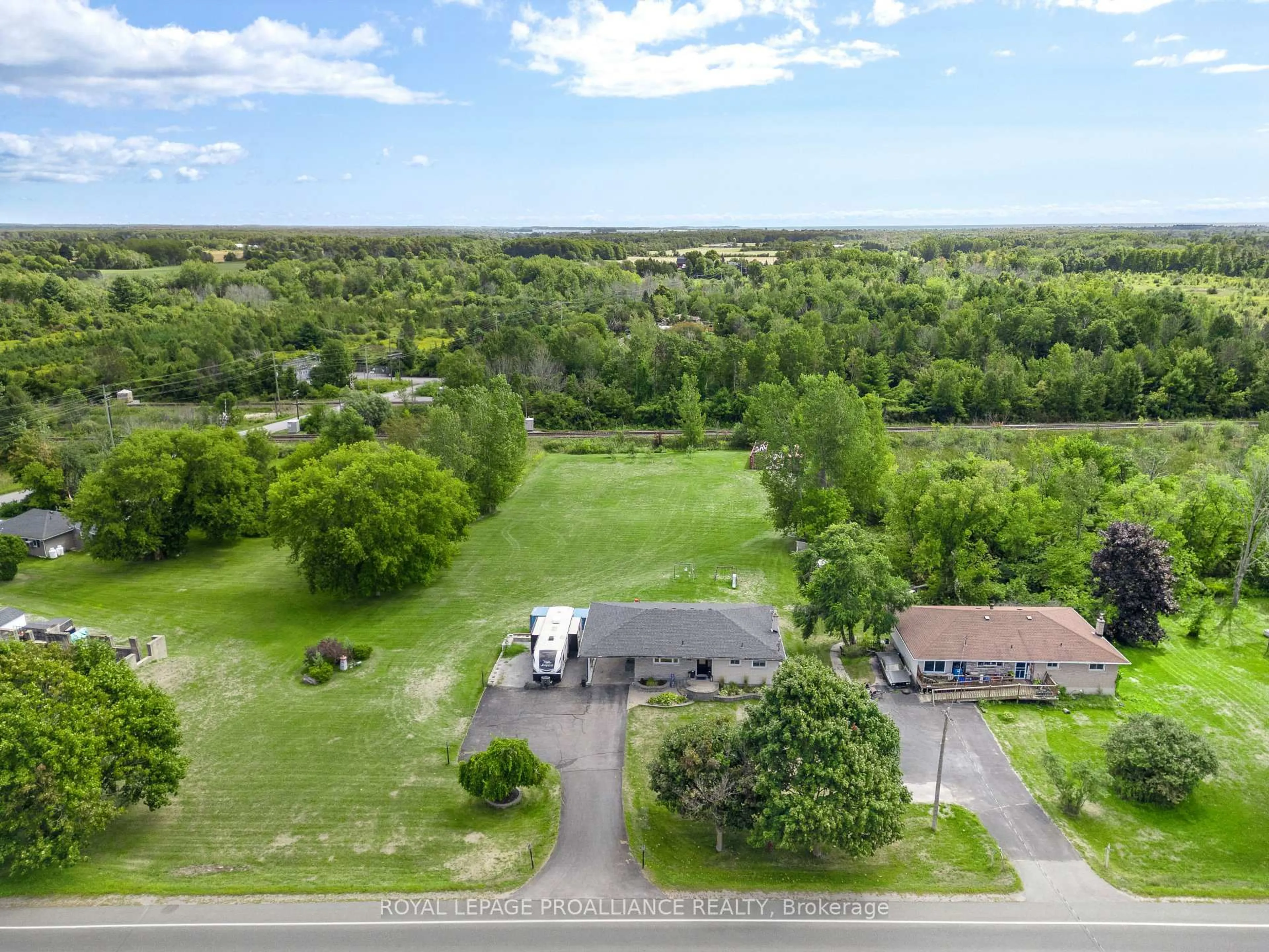 A pic from outside/outdoor area/front of a property/back of a property/a pic from drone, water/lake/river/ocean view for 16395 Highway 2 Highway, Trenton Ontario K8V 5P7