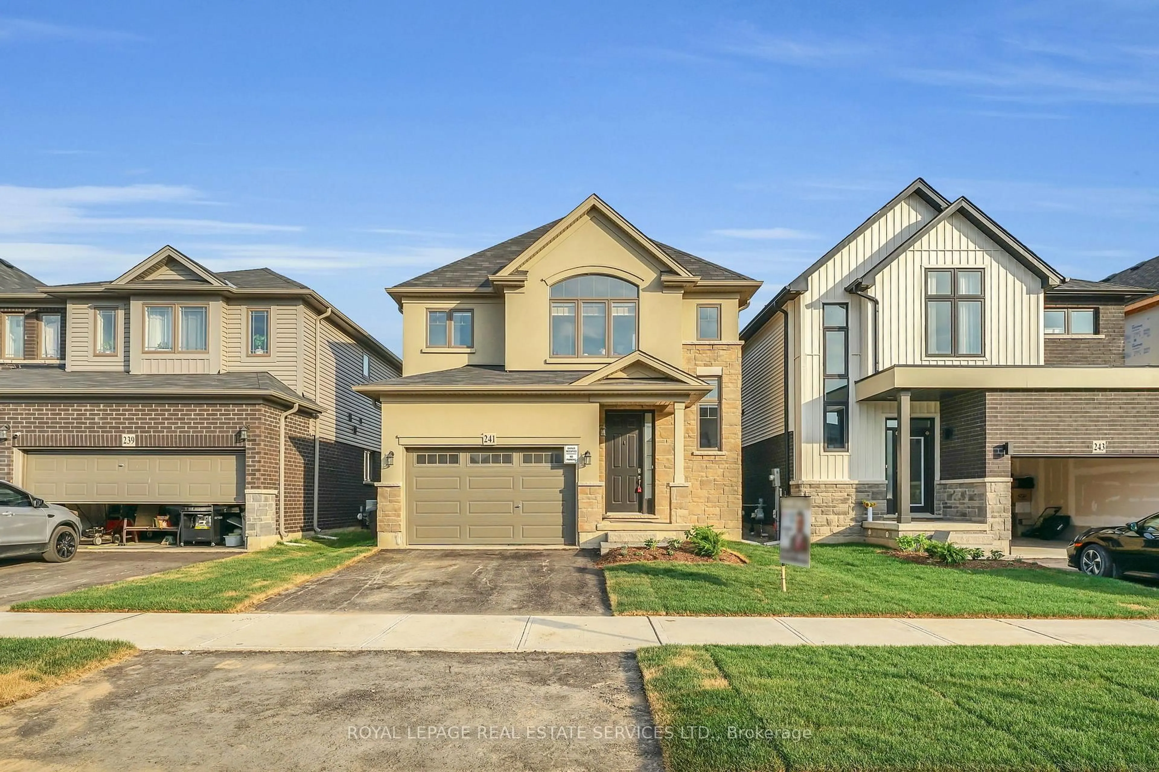 Home with brick exterior material, street for 241 Longboat Ru, Brantford Ontario N3T 5L5