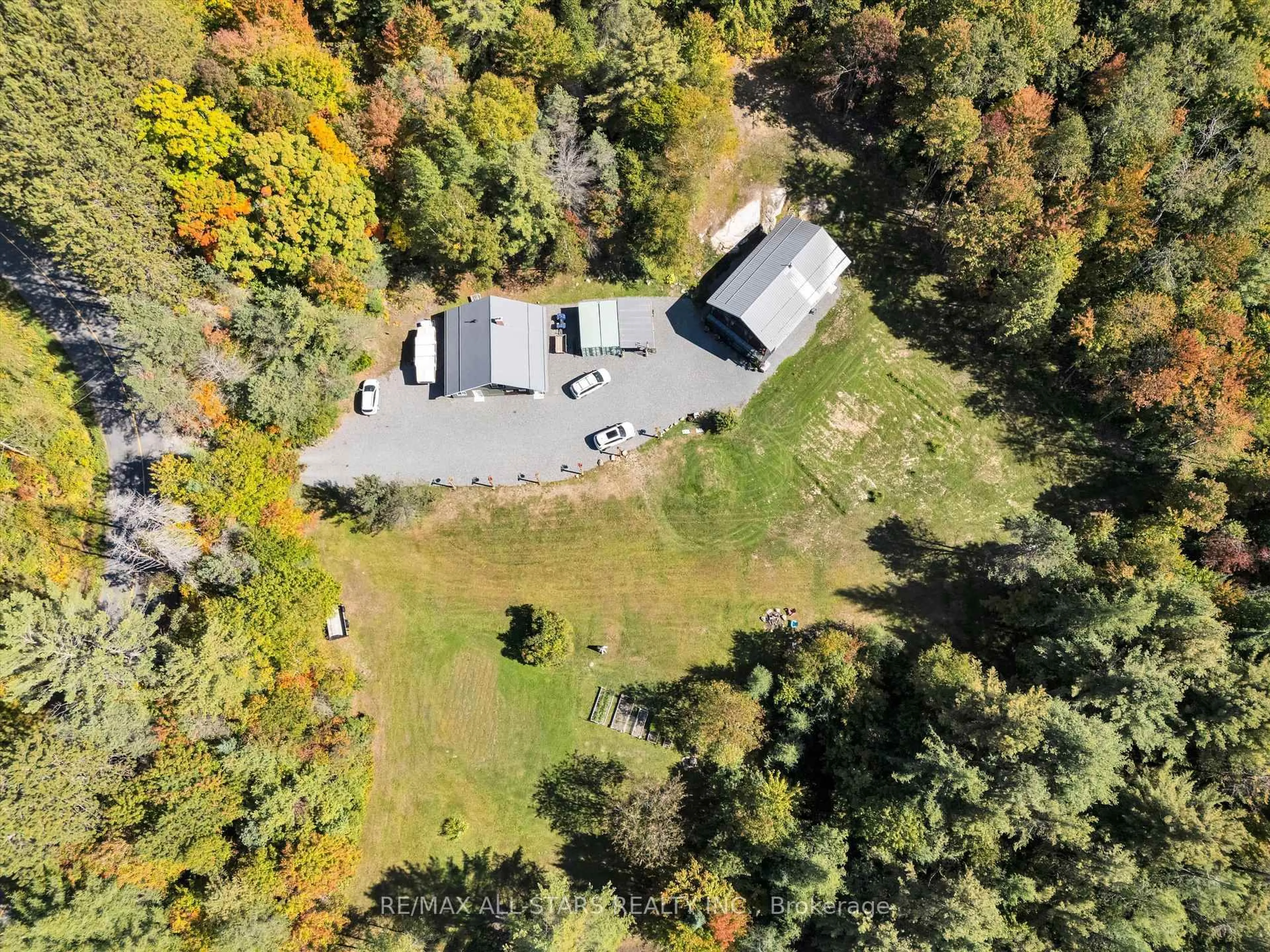 A pic from outside/outdoor area/front of a property/back of a property/a pic from drone, forest/trees view for 1435 Falkenburg Rd, Muskoka Lakes Ontario P1L 1X4