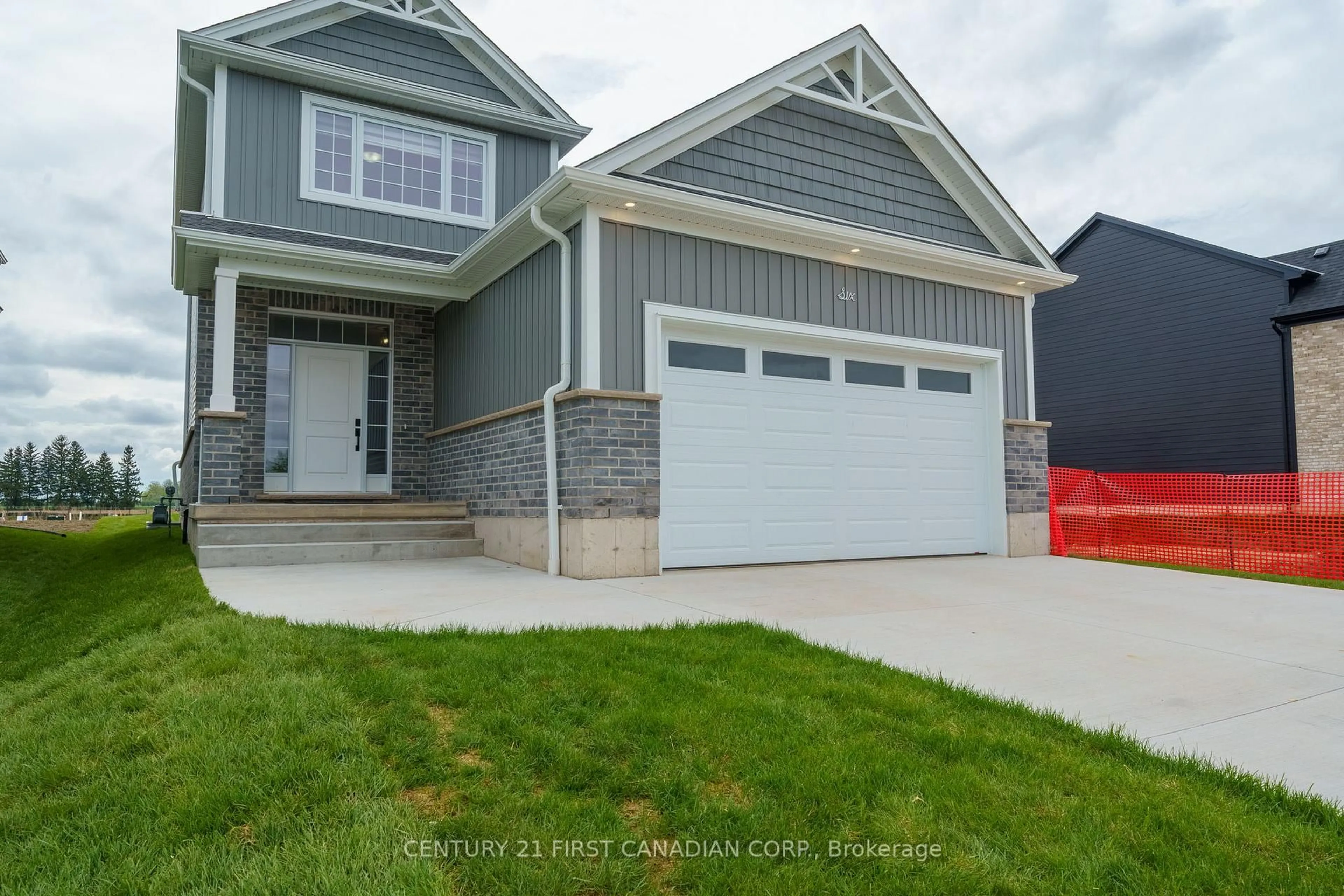 Home with vinyl exterior material, street for 6 Sheldabren St, North Middlesex Ontario N0M 1A0