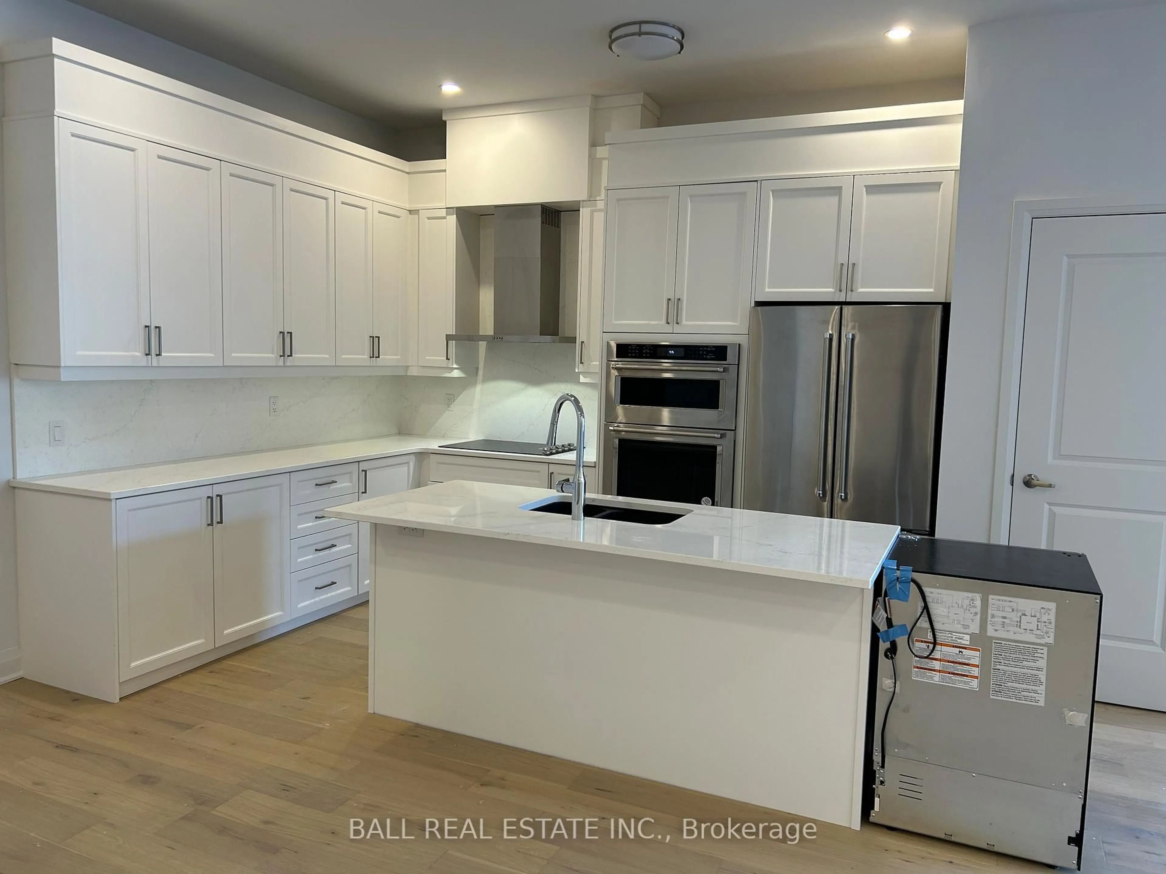 Open concept kitchen, unknown for 99 Louisa St #107, Kawartha Lakes Ontario K0M 1N0