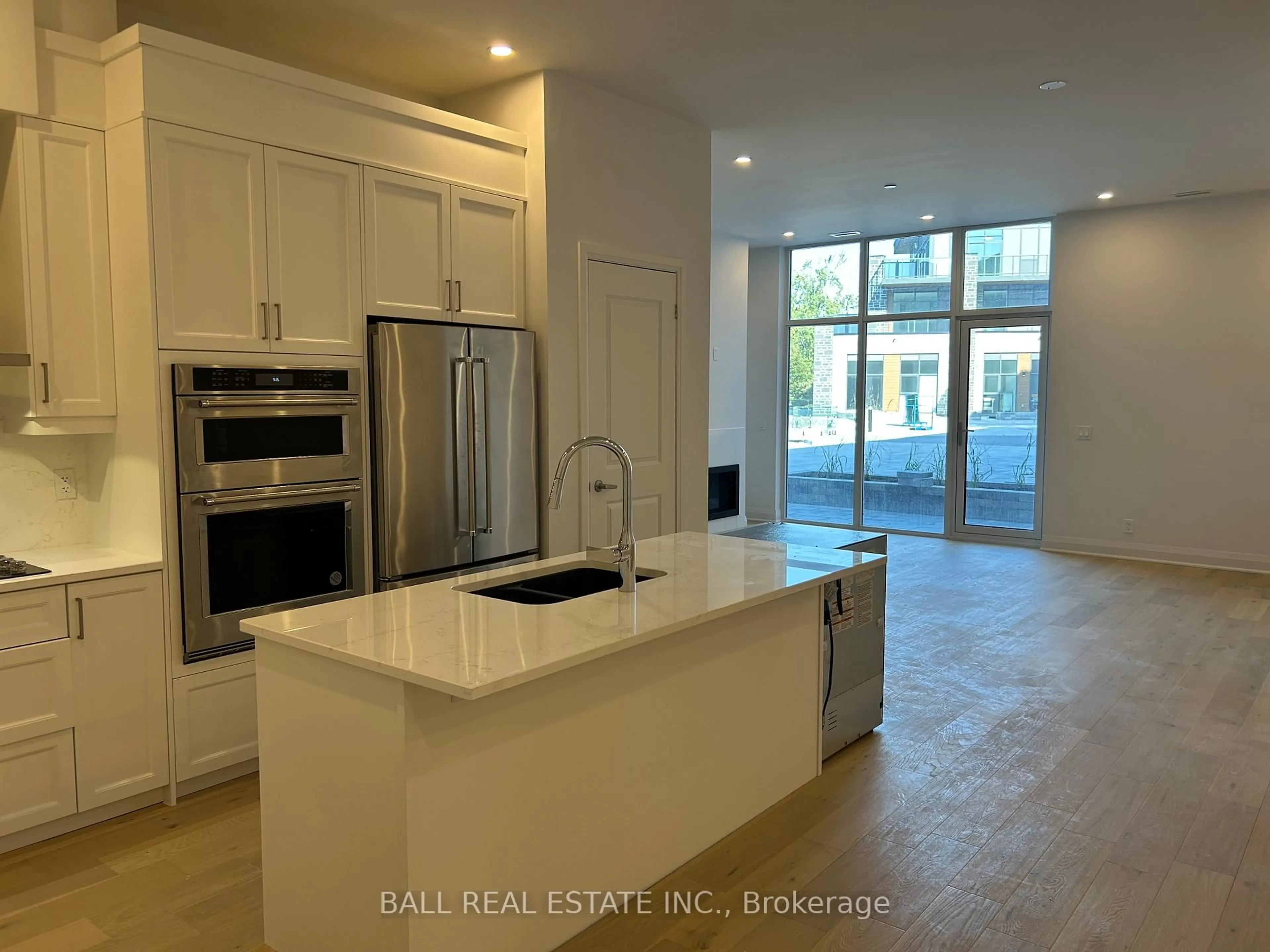 Open concept kitchen, ceramic/tile floor for 99 Louisa St #107, Kawartha Lakes Ontario K0M 1N0