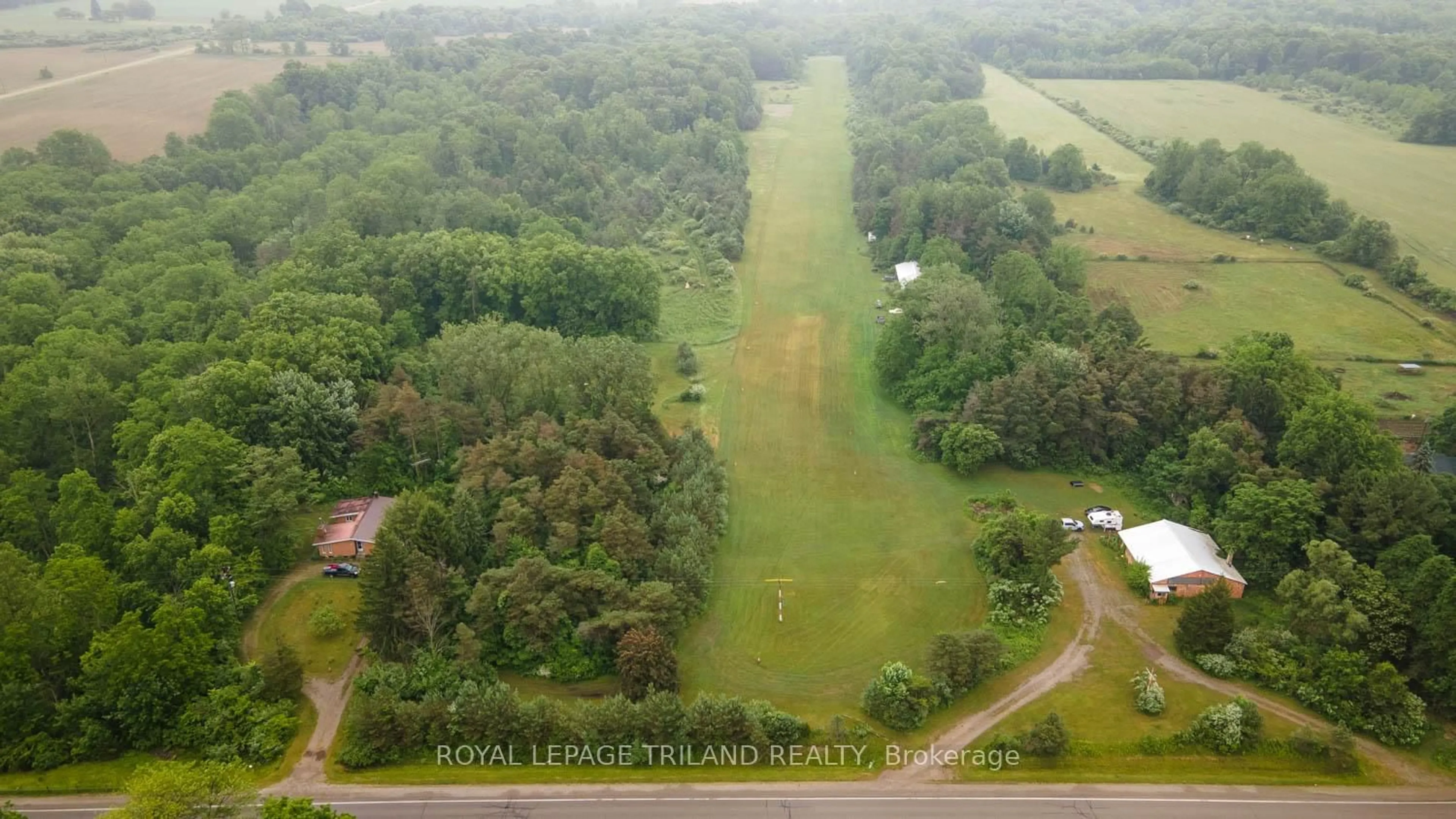 A pic from outside/outdoor area/front of a property/back of a property/a pic from drone, water/lake/river/ocean view for 23171 Talbot Line, West Elgin Ontario N0L 2C0