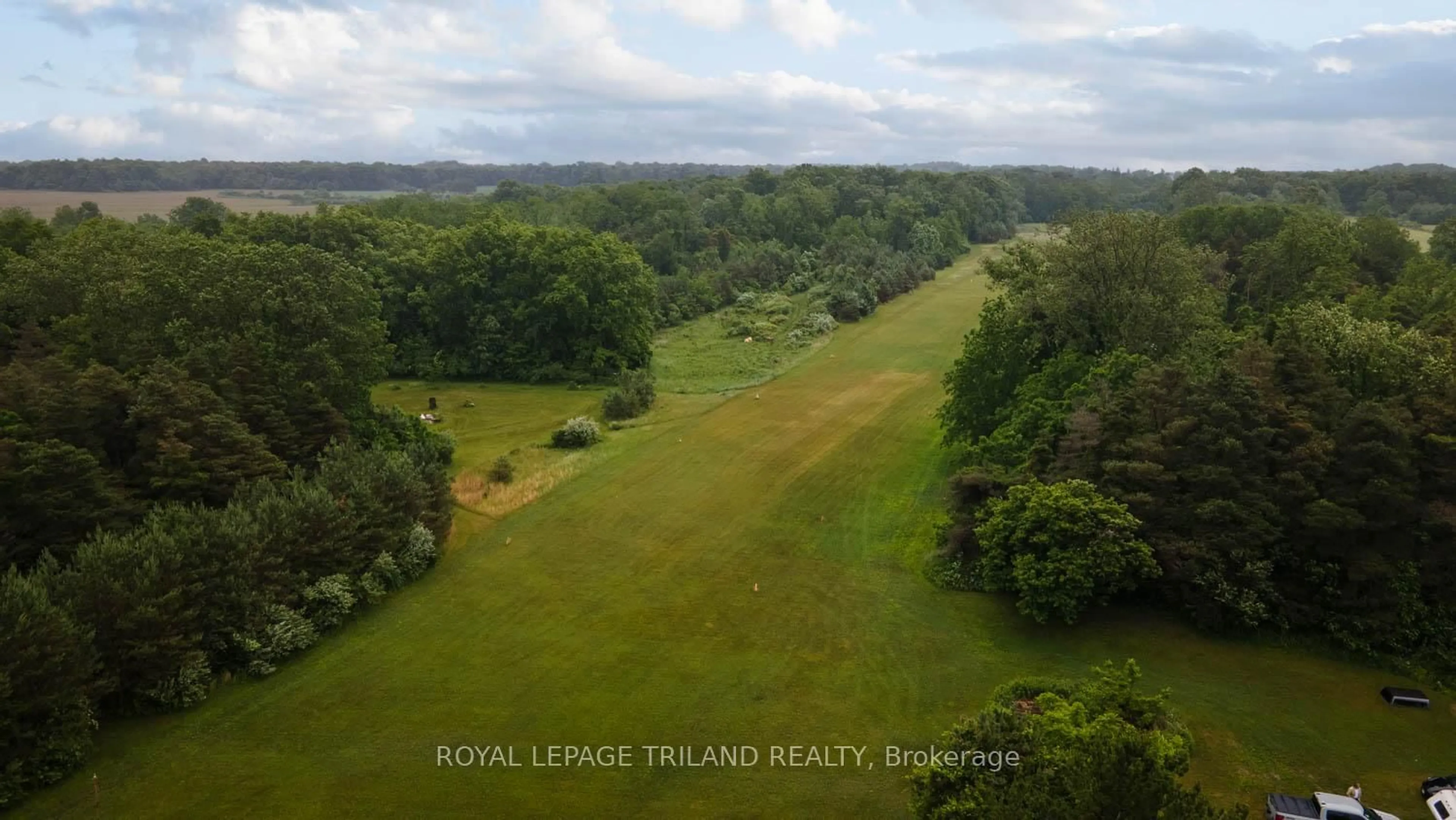 A pic from outside/outdoor area/front of a property/back of a property/a pic from drone, forest/trees view for 23171 Talbot Line, West Elgin Ontario N0L 2C0