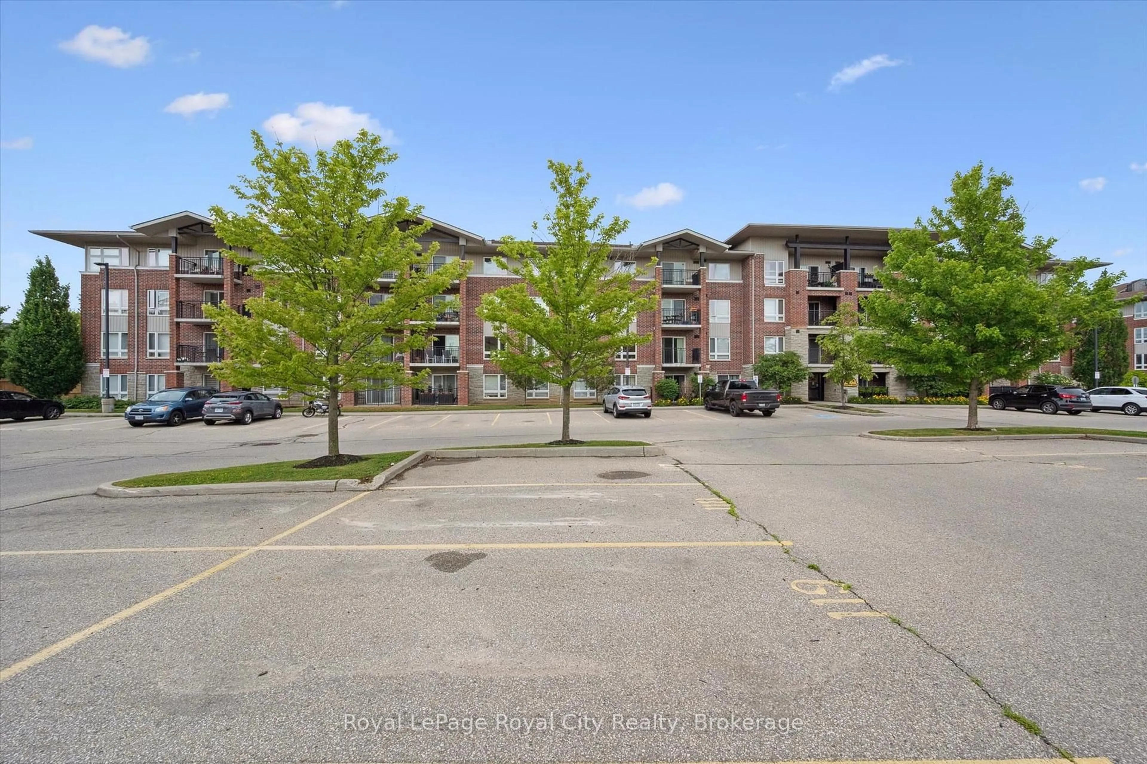 A pic from outside/outdoor area/front of a property/back of a property/a pic from drone, unknown for 37 Goodwin Dr #212, Guelph Ontario N1L 0E6