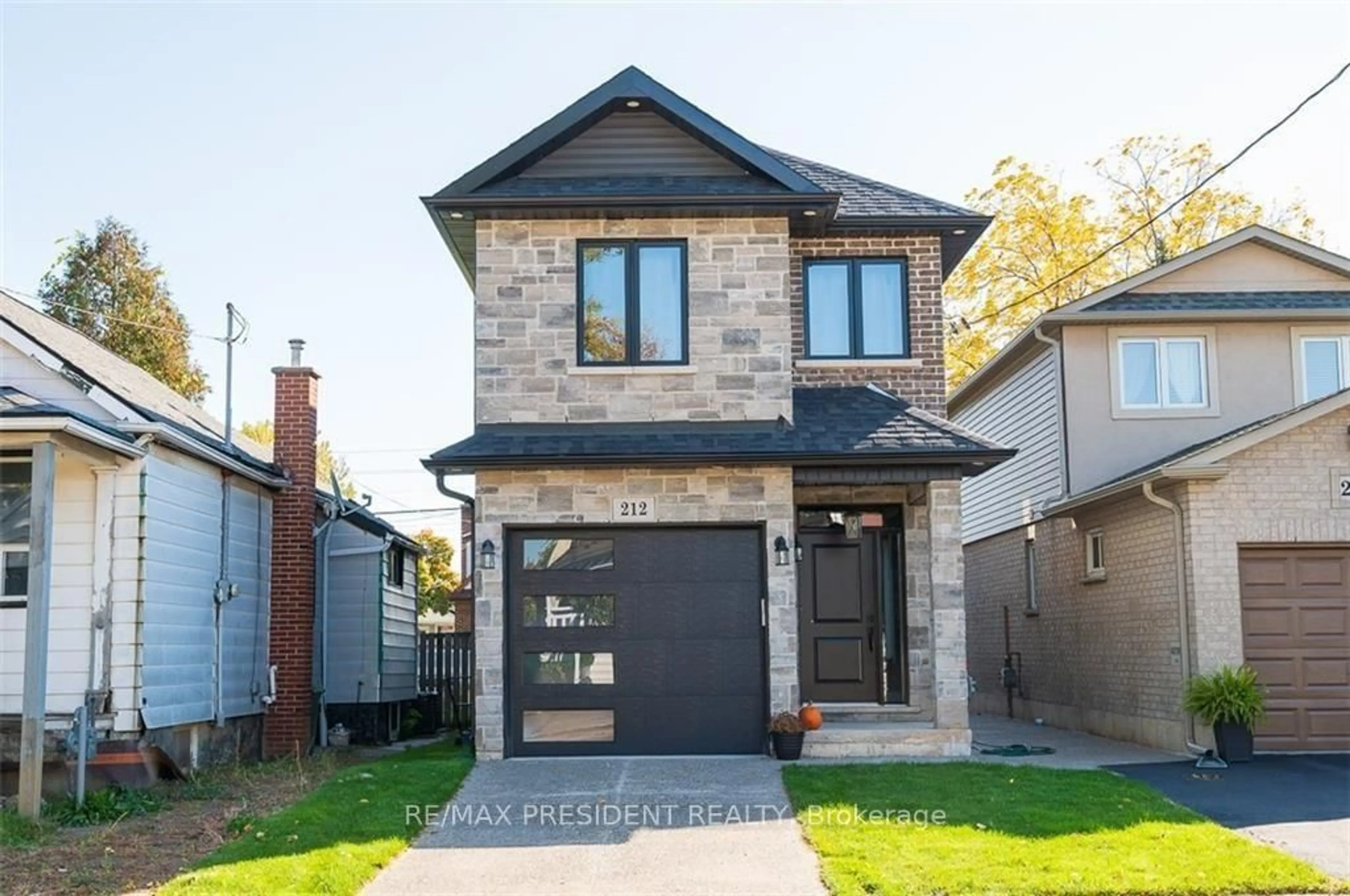 Home with brick exterior material, street for 212 Weir #Street, Hamilton Ontario L8H 5G3