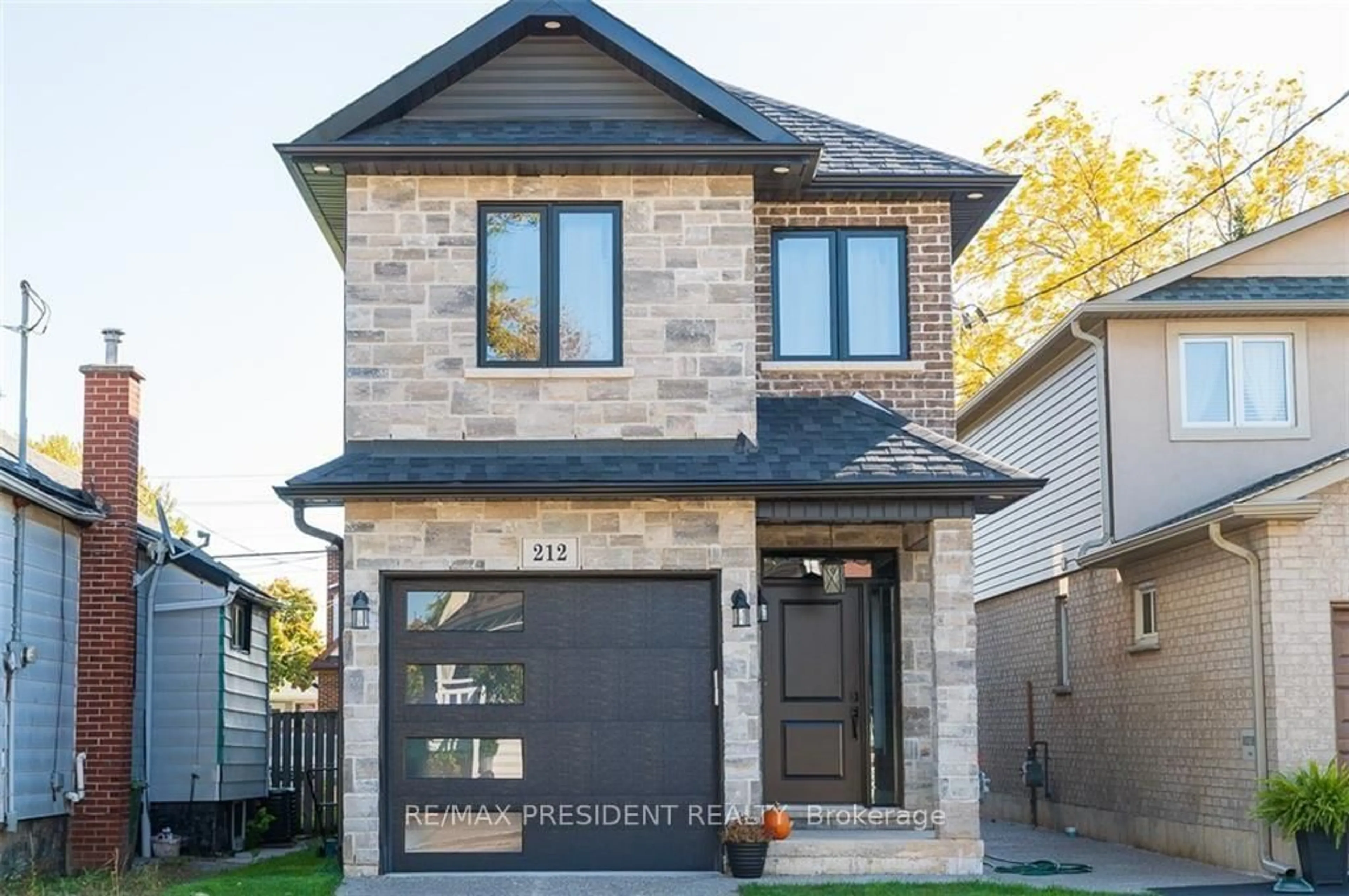 Home with brick exterior material, street for 212 Weir #Street, Hamilton Ontario L8H 5G3