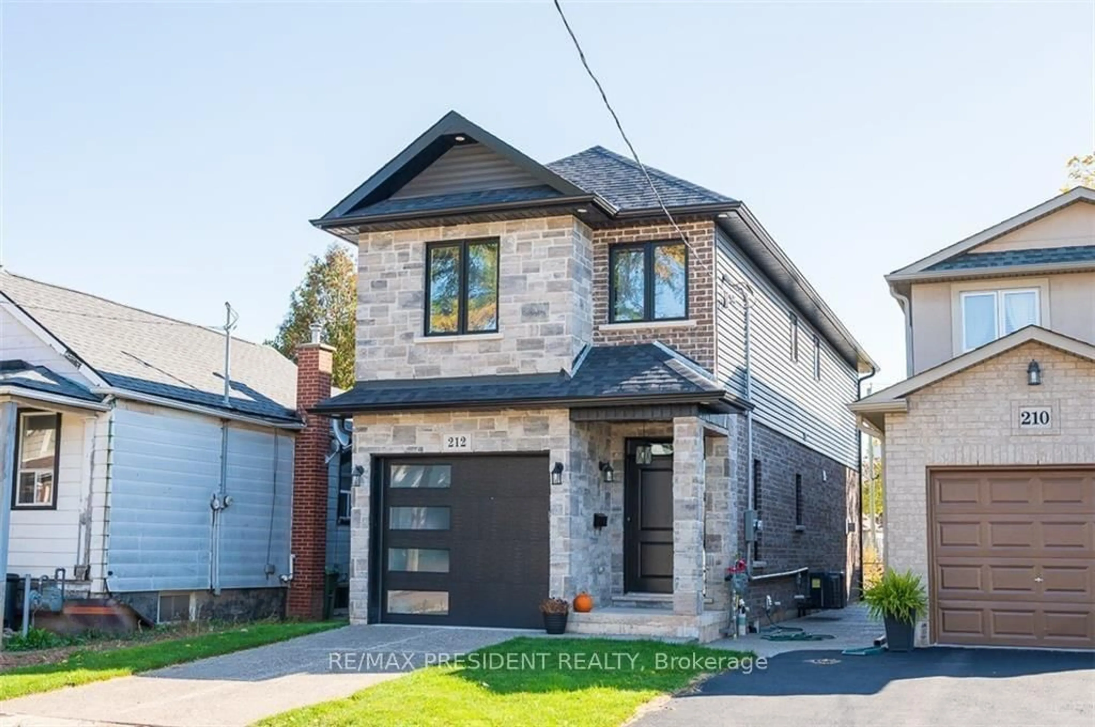 Home with brick exterior material, street for 212 Weir #Street, Hamilton Ontario L8H 5G3