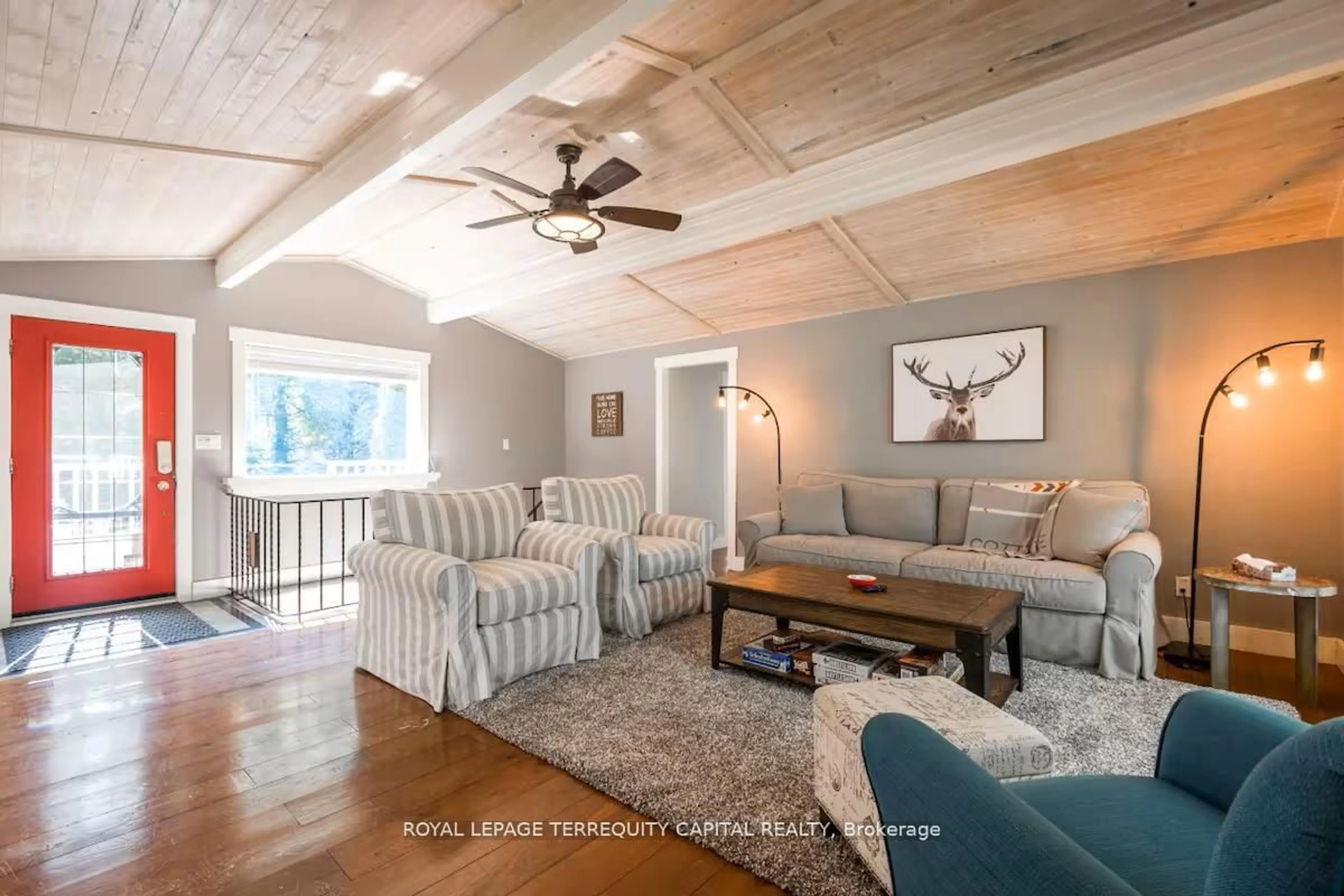 Living room with furniture, wood/laminate floor for 9 Denniss Dr, Bracebridge Ontario P1L 1W9