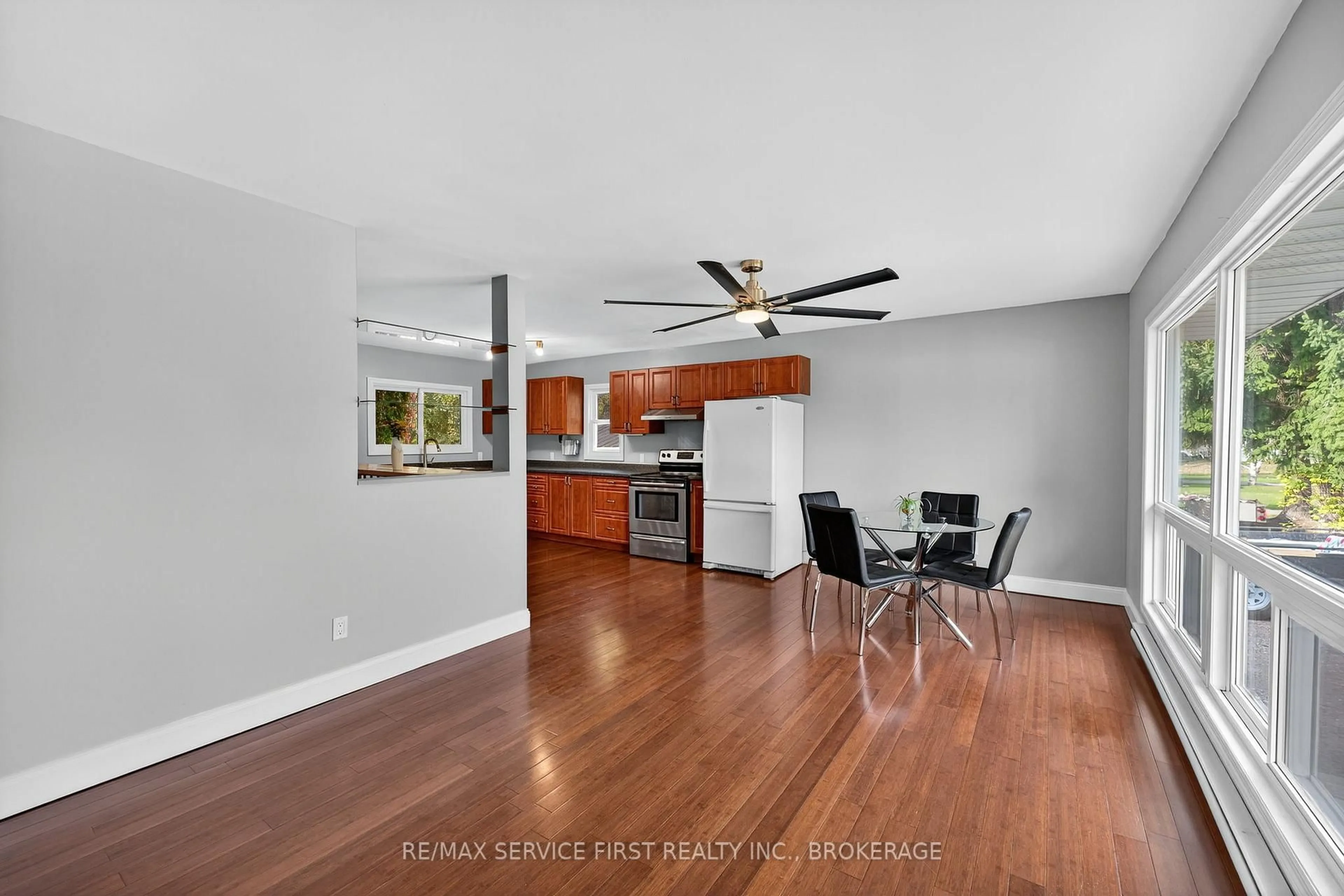 Open concept kitchen, wood/laminate floor for 3007 Princess St, Kingston Ontario K7L 4V2