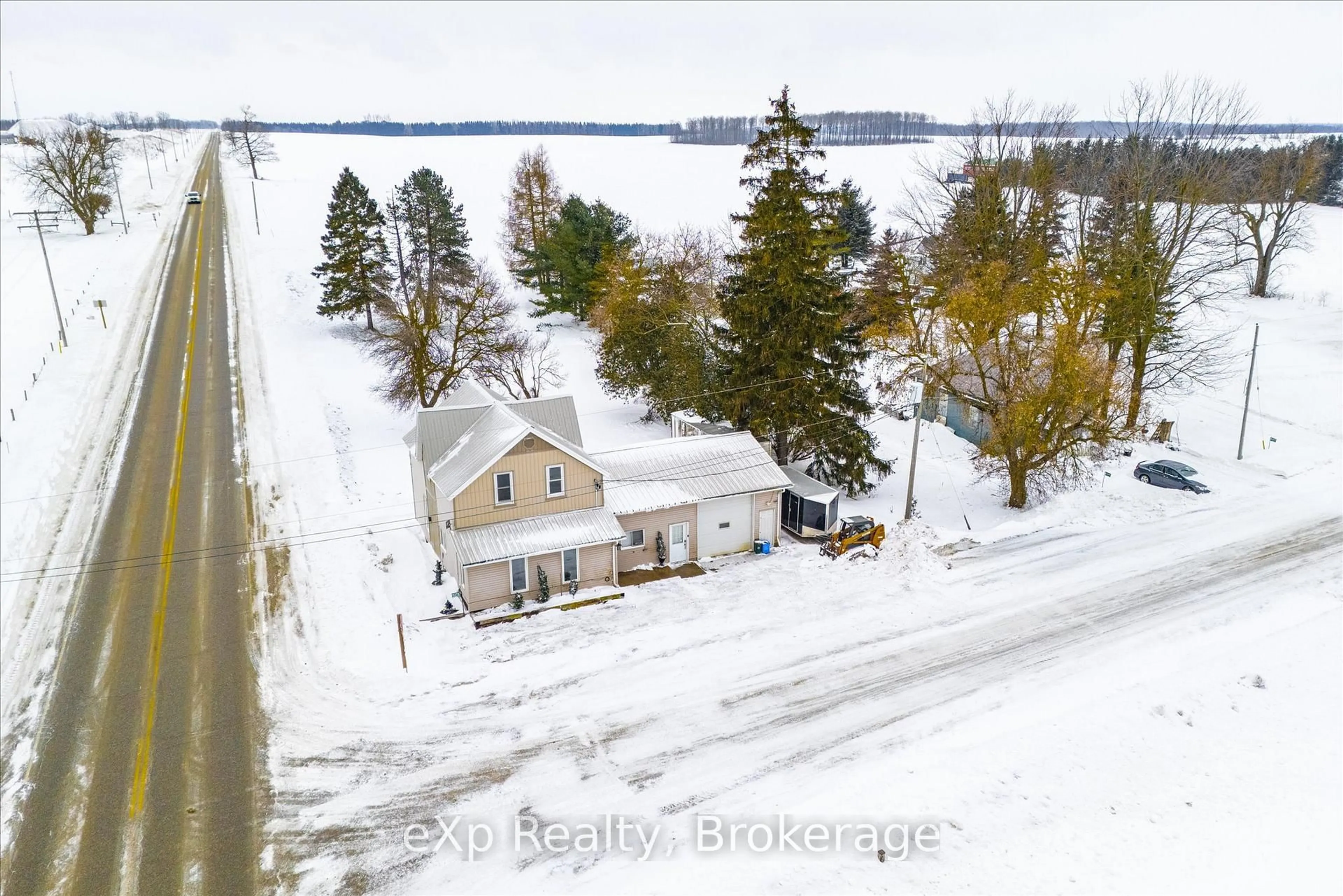 A pic from outside/outdoor area/front of a property/back of a property/a pic from drone, street for 9276 Wellington Rd 16, Wellington North Ontario N0G 2E0