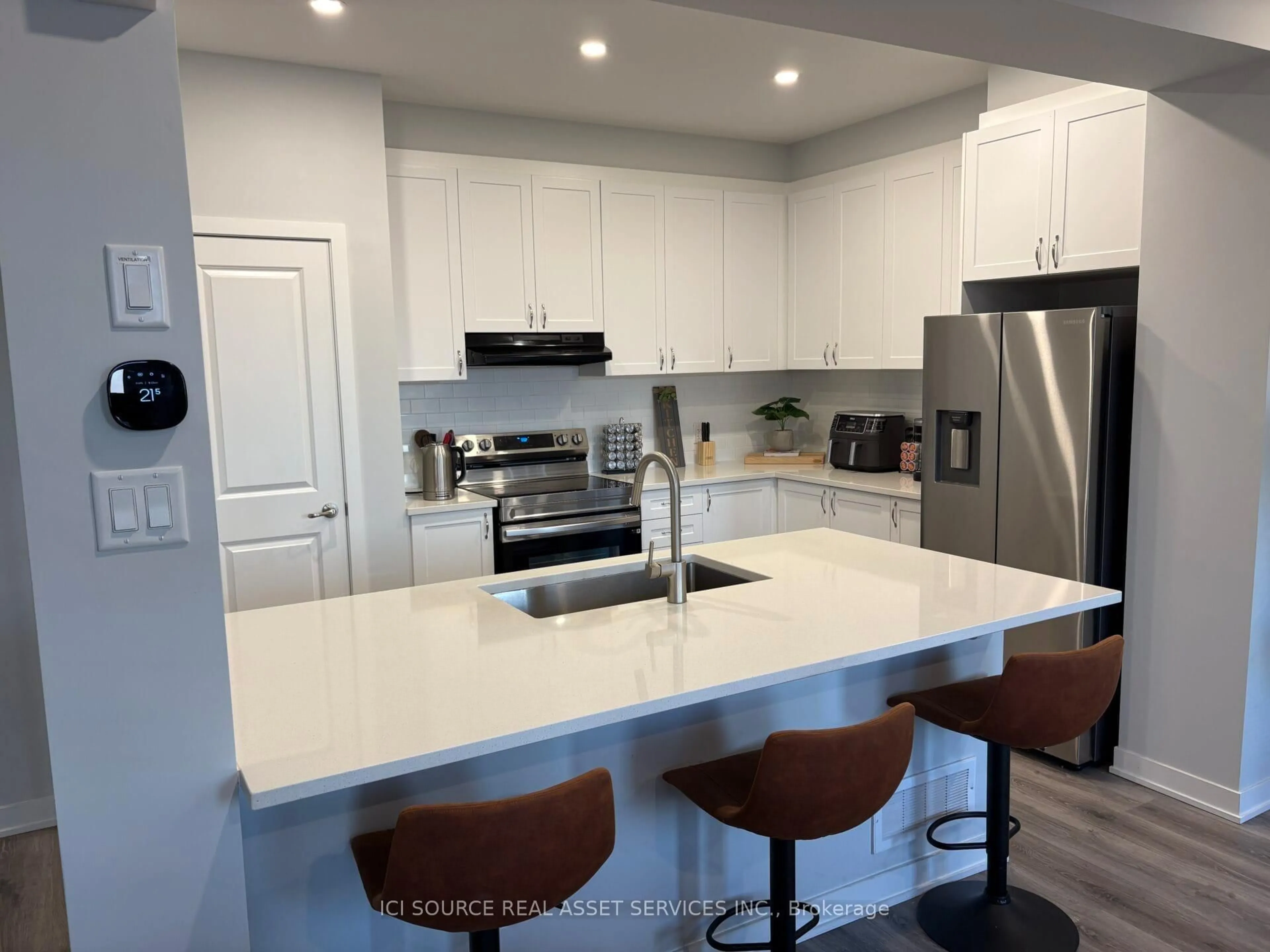 Open concept kitchen, ceramic/tile floor for 617 Quilter Row, Richmond Ontario K0A 2Z0