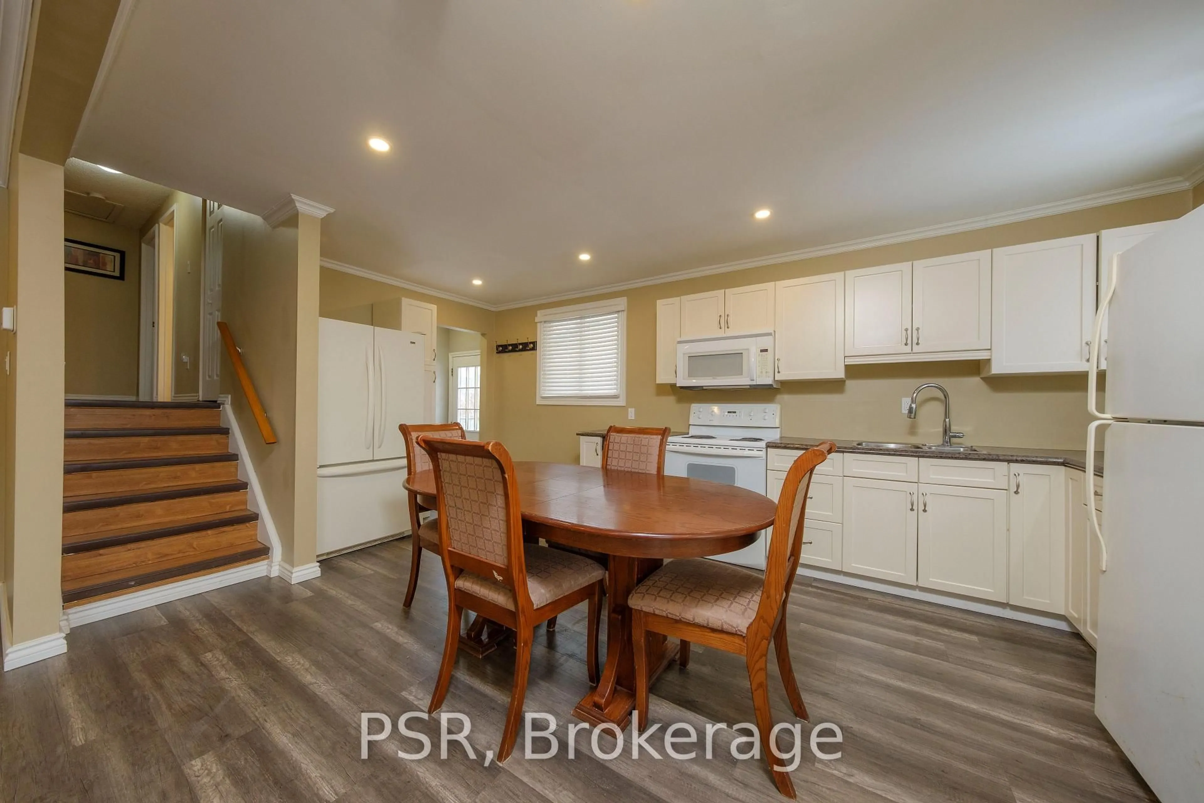 Open concept kitchen, wood/laminate floor for 708 Johnston Cres, Kincardine Ontario N2Z 1S4