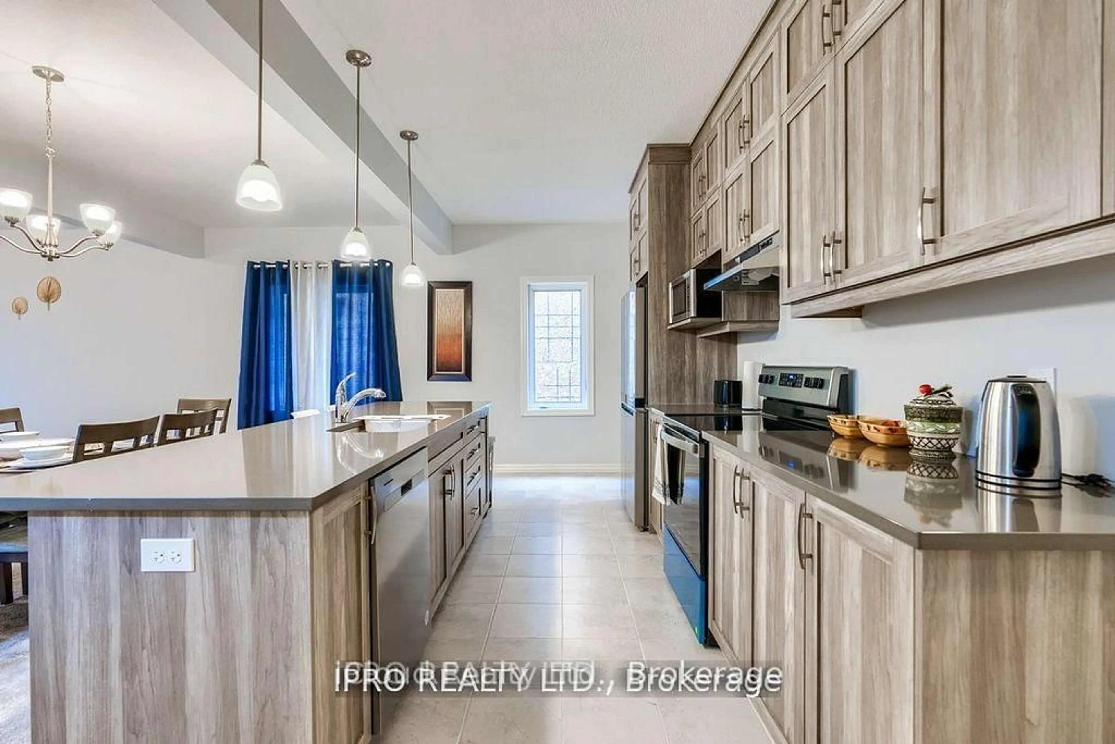 Open concept kitchen, ceramic/tile floor for 99 Honey St, Cambridge Ontario N1T 0C6