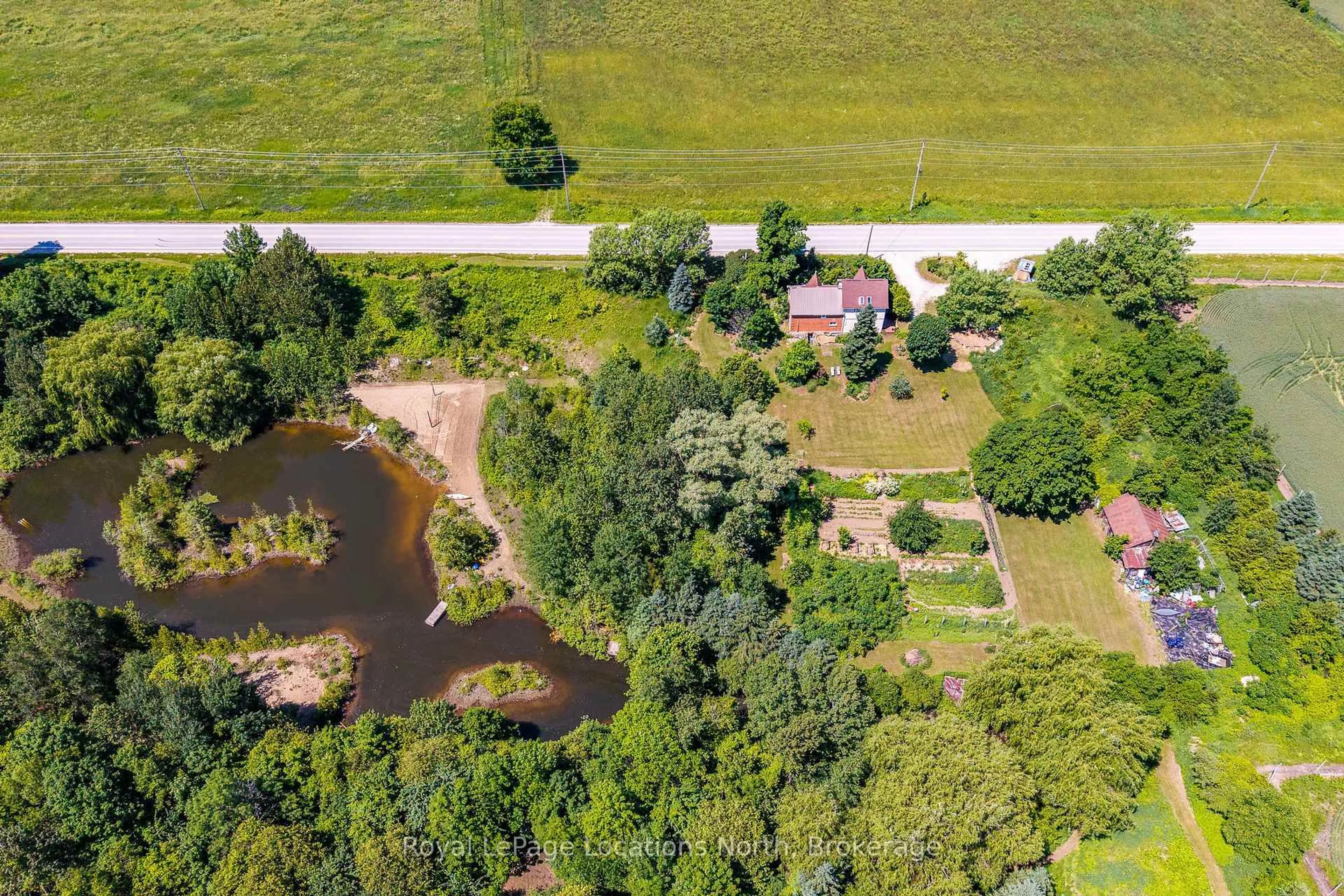 A pic from outside/outdoor area/front of a property/back of a property/a pic from drone, water/lake/river/ocean view for 138237 Grey Road 112, Meaford Ontario N4L 1W5