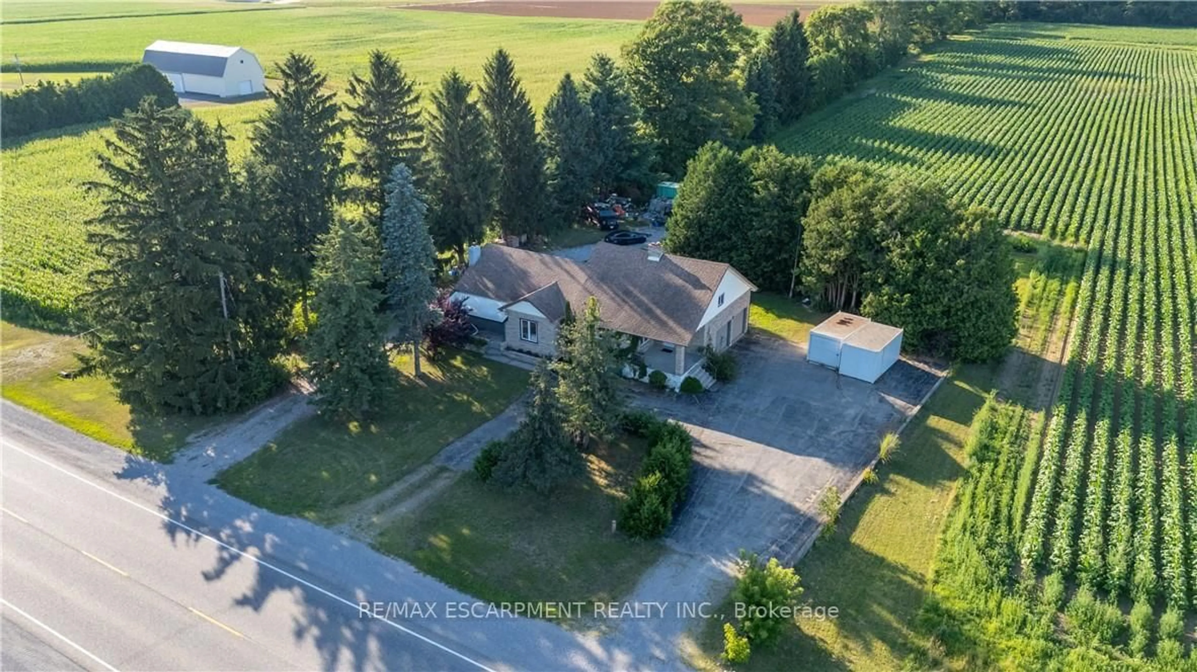 A pic from outside/outdoor area/front of a property/back of a property/a pic from drone, street for 2865 Highway 3, Norfolk Ontario N3Y 4J9