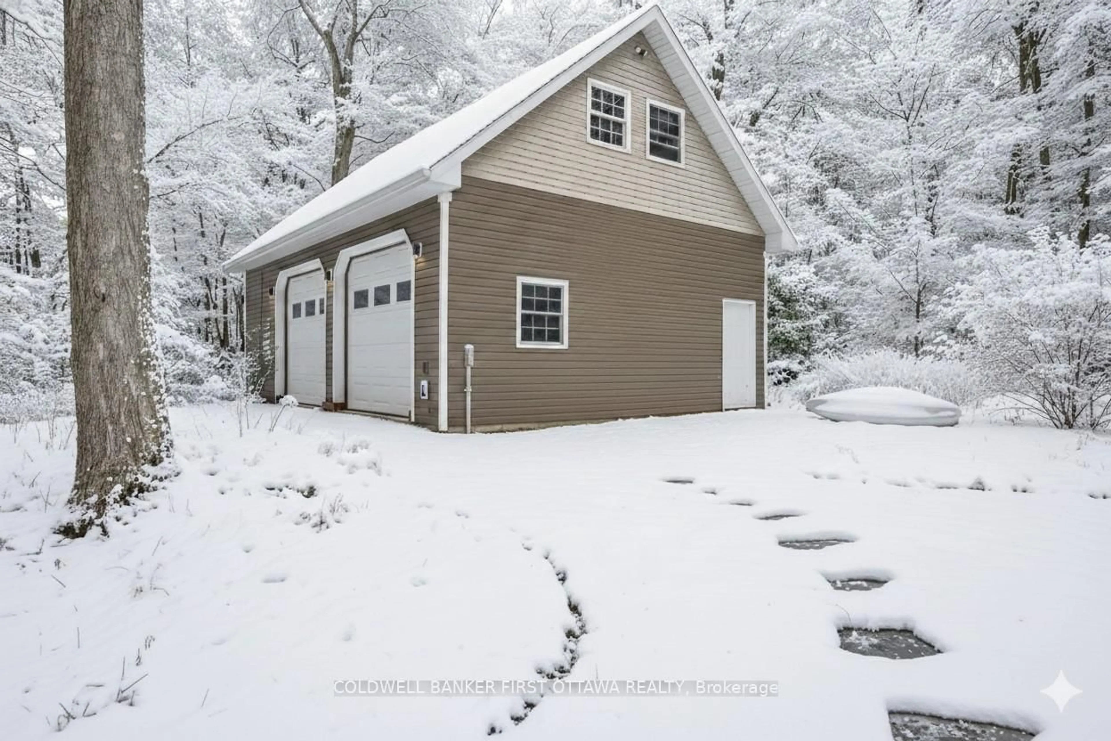 Indoor garage for 99 Old Kingston Rd, Rideau Lakes Ontario K0G 1L0
