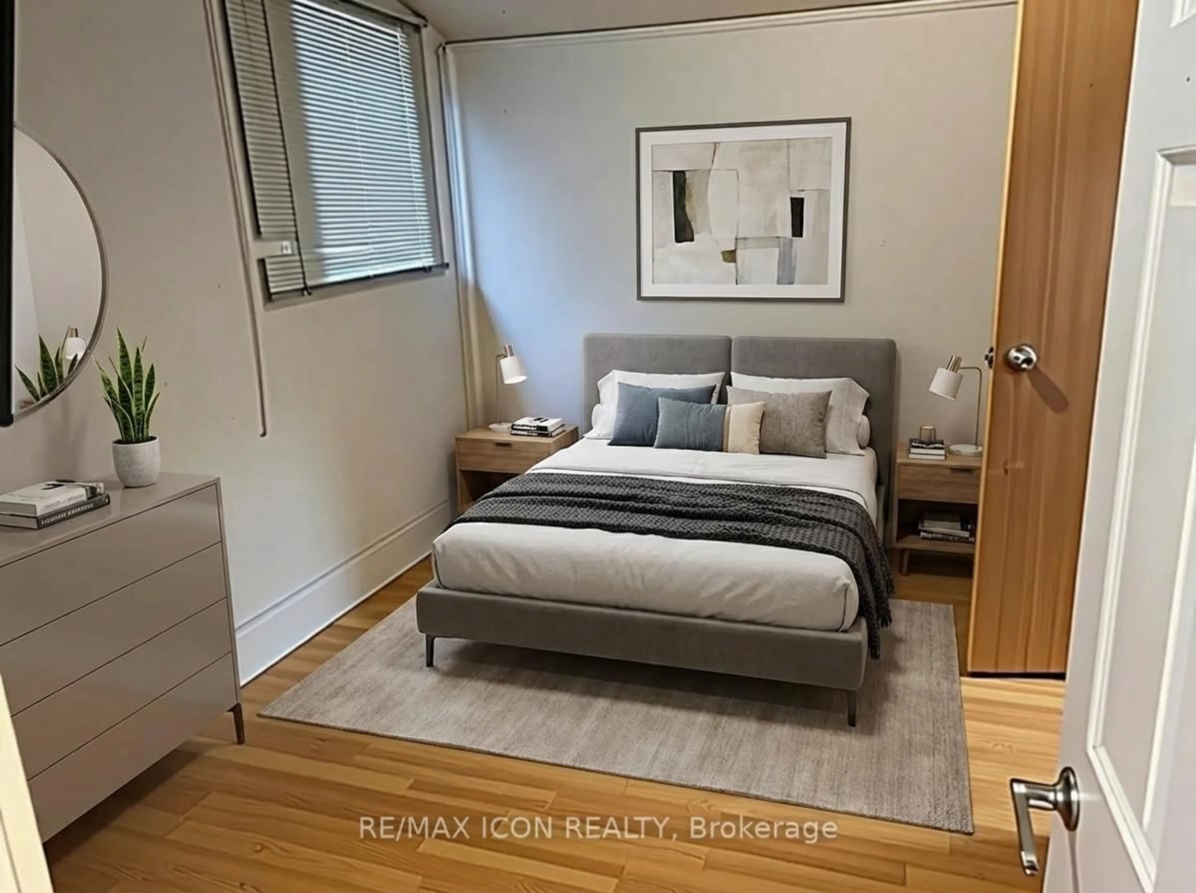 Bedroom with bed, wood/laminate floor for 565 South St, London East Ontario N6B 1C5