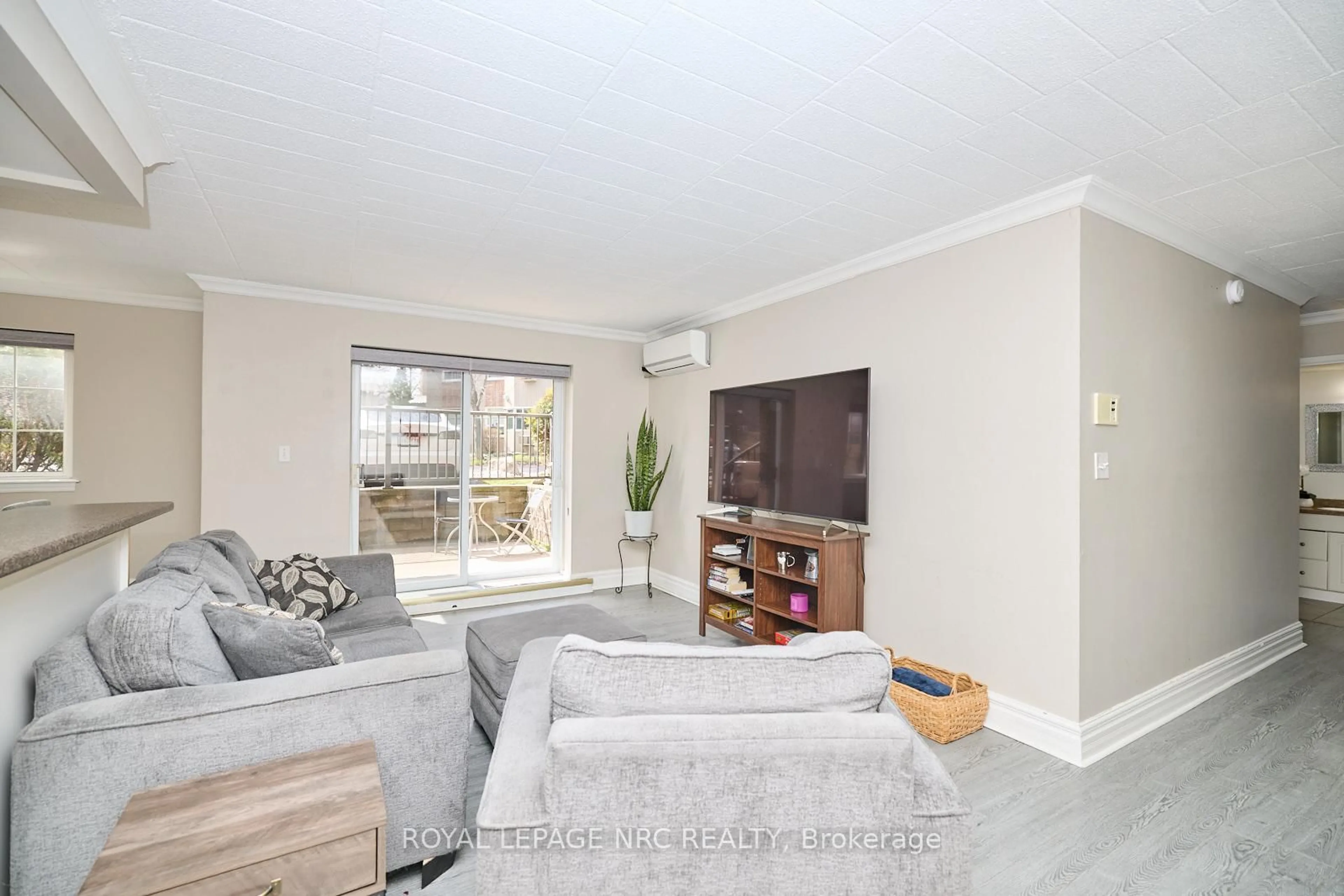 Living room with furniture, unknown for 20 John St #109, Grimsby Ontario L3M 1X5