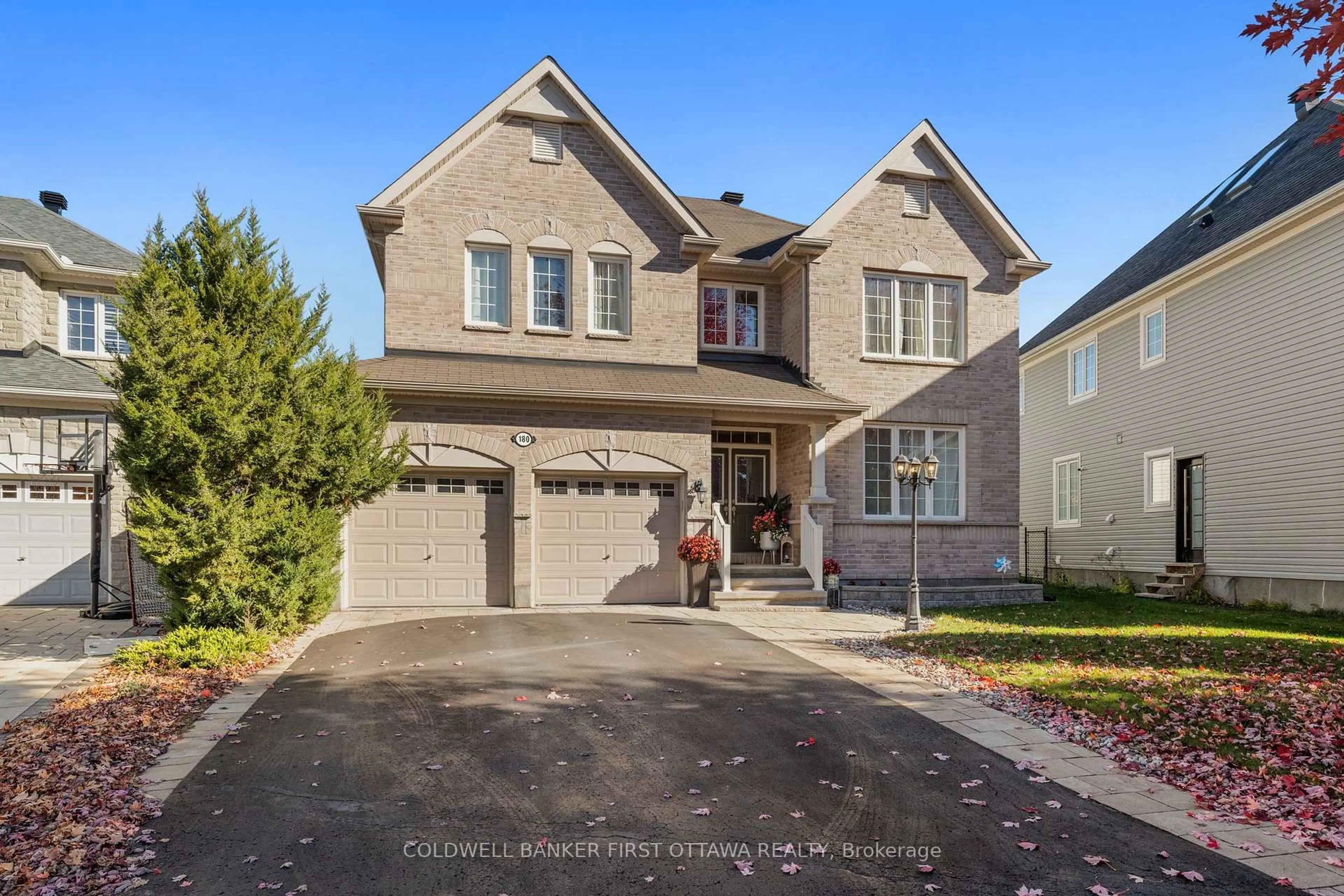 Home with brick exterior material, street for 180 Sunita Cres, Ottawa Ontario K2J 5S8