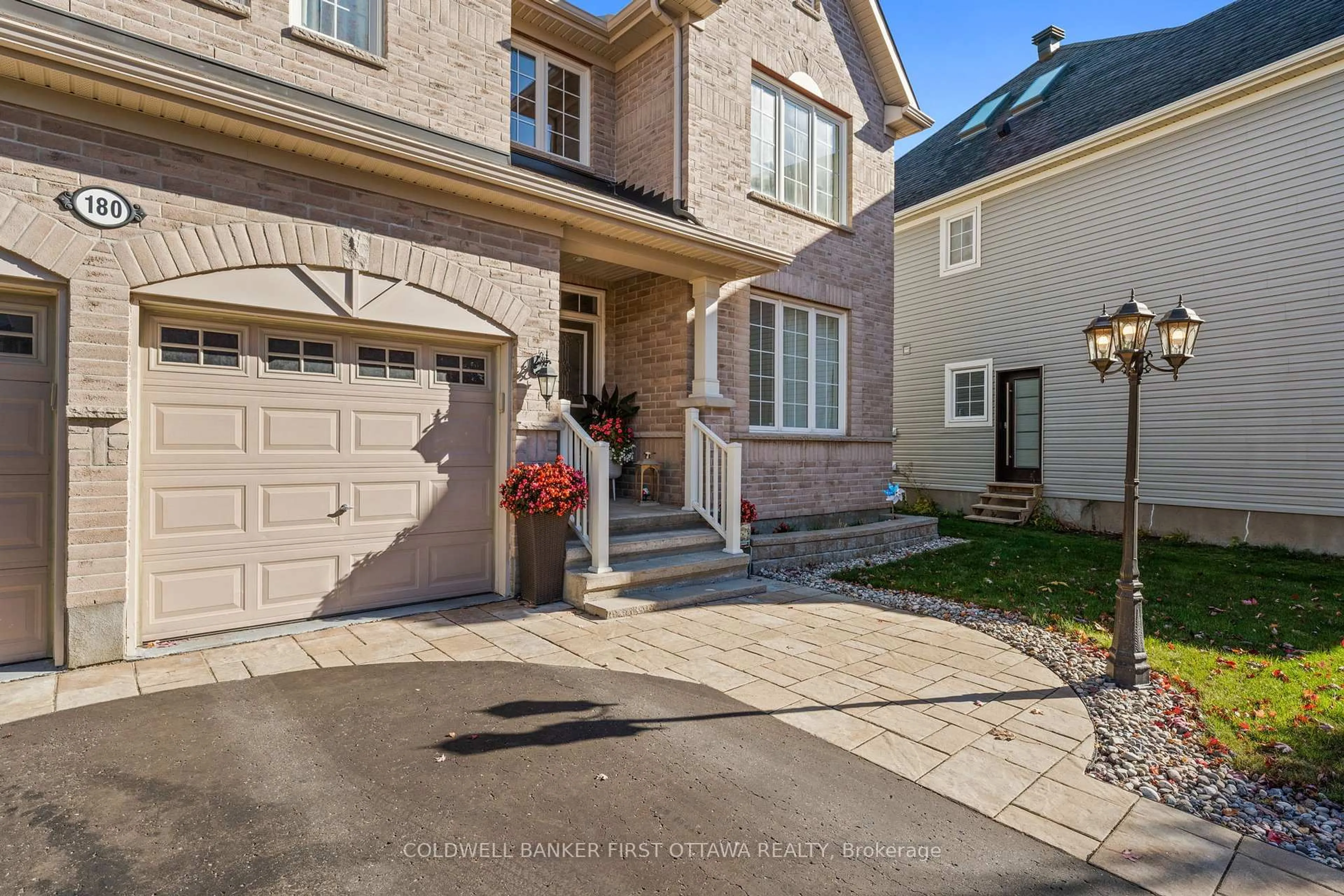 Home with brick exterior material, street for 180 Sunita Cres, Ottawa Ontario K2J 5S8