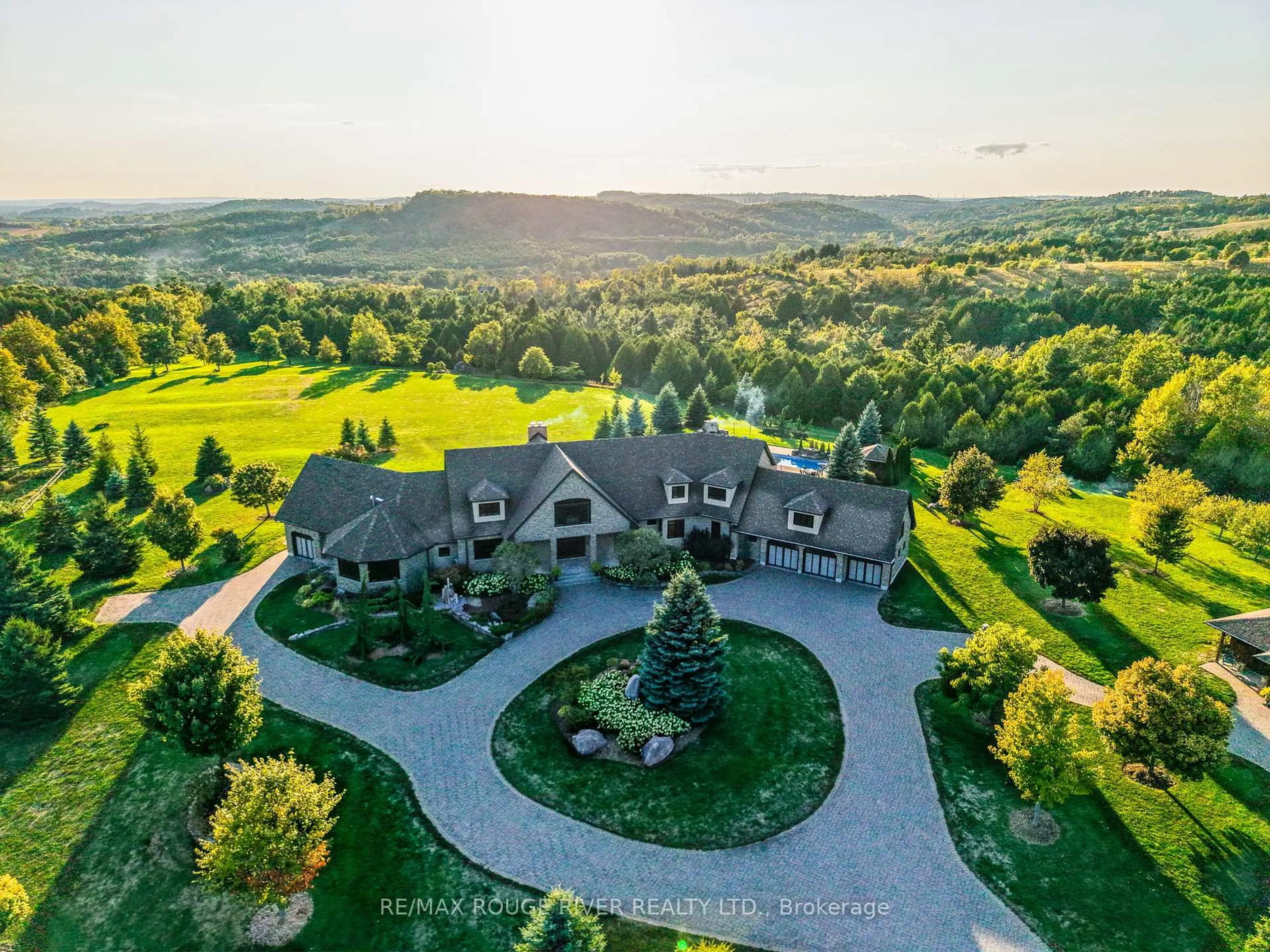 A pic from outside/outdoor area/front of a property/back of a property/a pic from drone, mountain view for 3622 Alnwick Hills Rd, Hamilton Township Ontario K0K 1C0