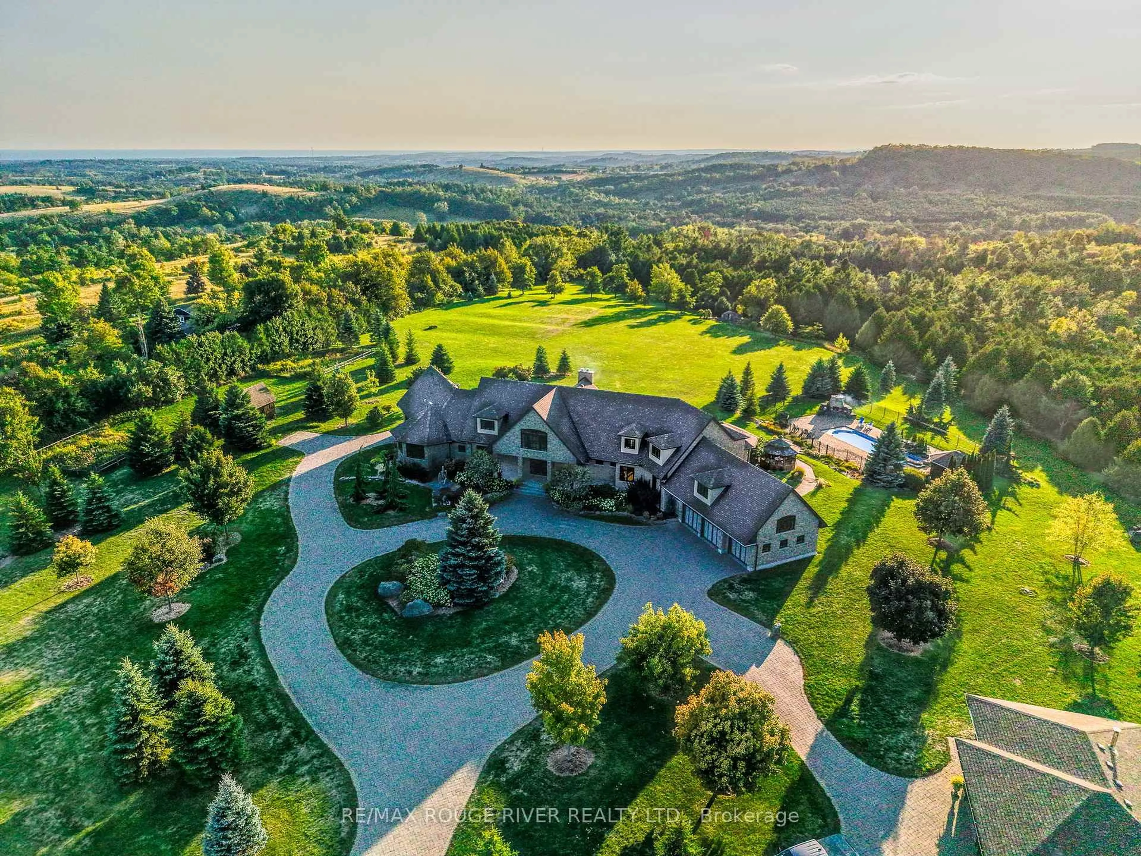 A pic from outside/outdoor area/front of a property/back of a property/a pic from drone, mountain view for 3622 Alnwick Hills Rd, Hamilton Township Ontario K0K 1C0